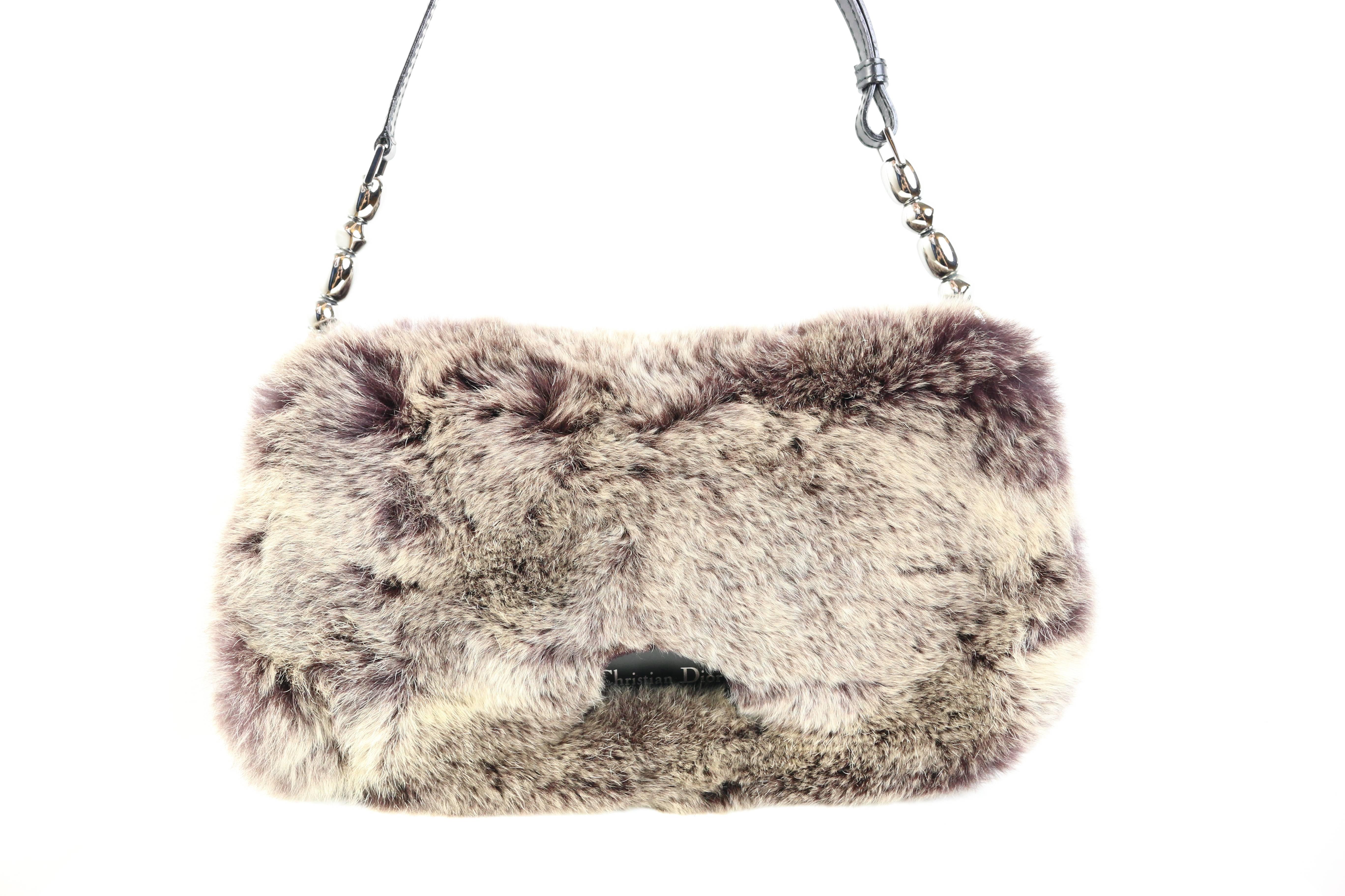 - John Galliano Dior early 2000s single leather strap with metal balls on each end of the strap. 

- Front clasp button closure. 

- Front is covered with super soft & luxurious rabbit fur & the back is made up of cloth canvas. with silver parallel