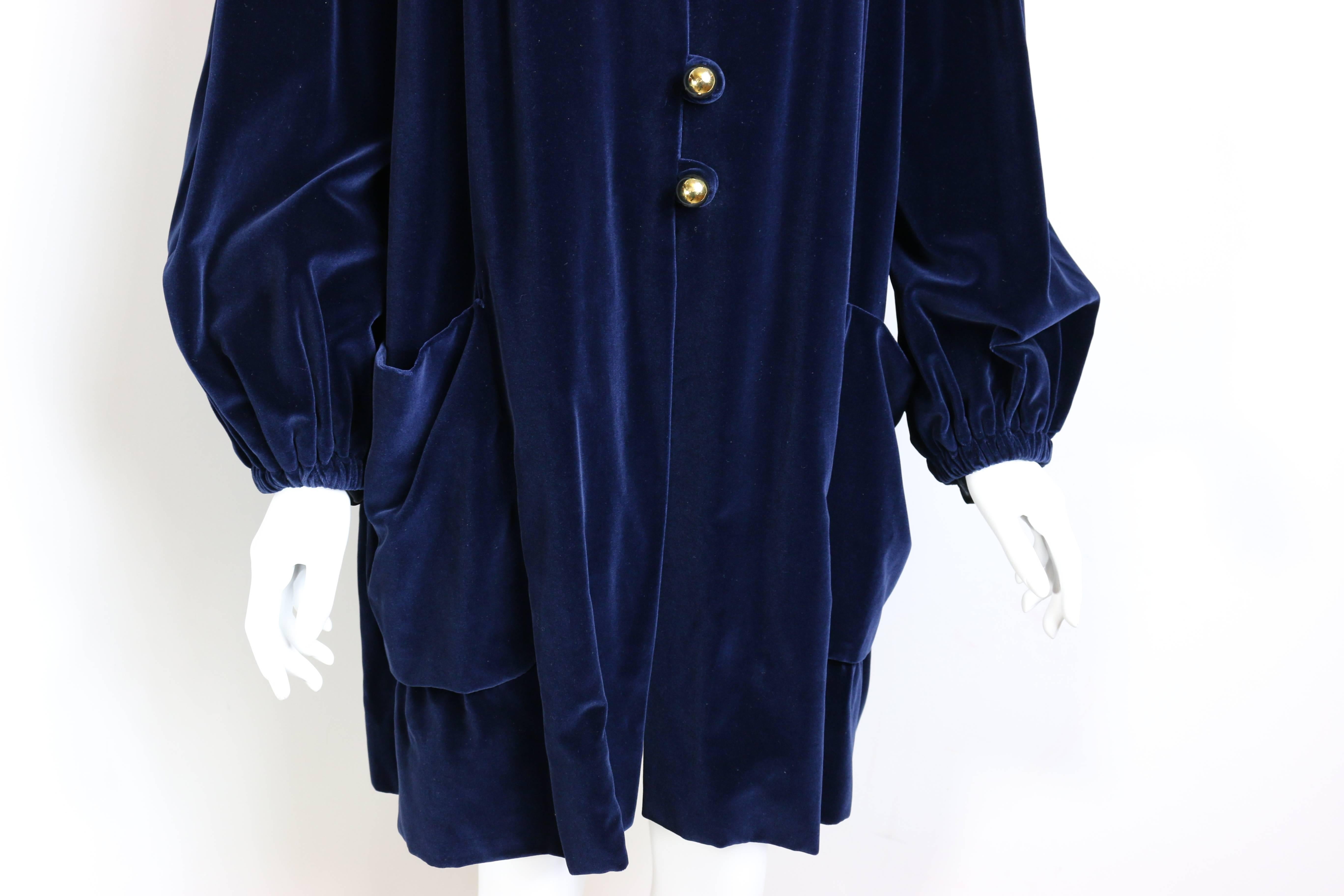 - Moschino Couture blue velvet jacket featuring eight gold buttons on front and two front pockets. 

-  Elastic Cuffs. 

- It fits a bit oversized. 

- Size 42 Italy. 

- 81% Cotton, 19% Silk I Lining : 100 %Rayon. 

- Shoulder: 16cm I