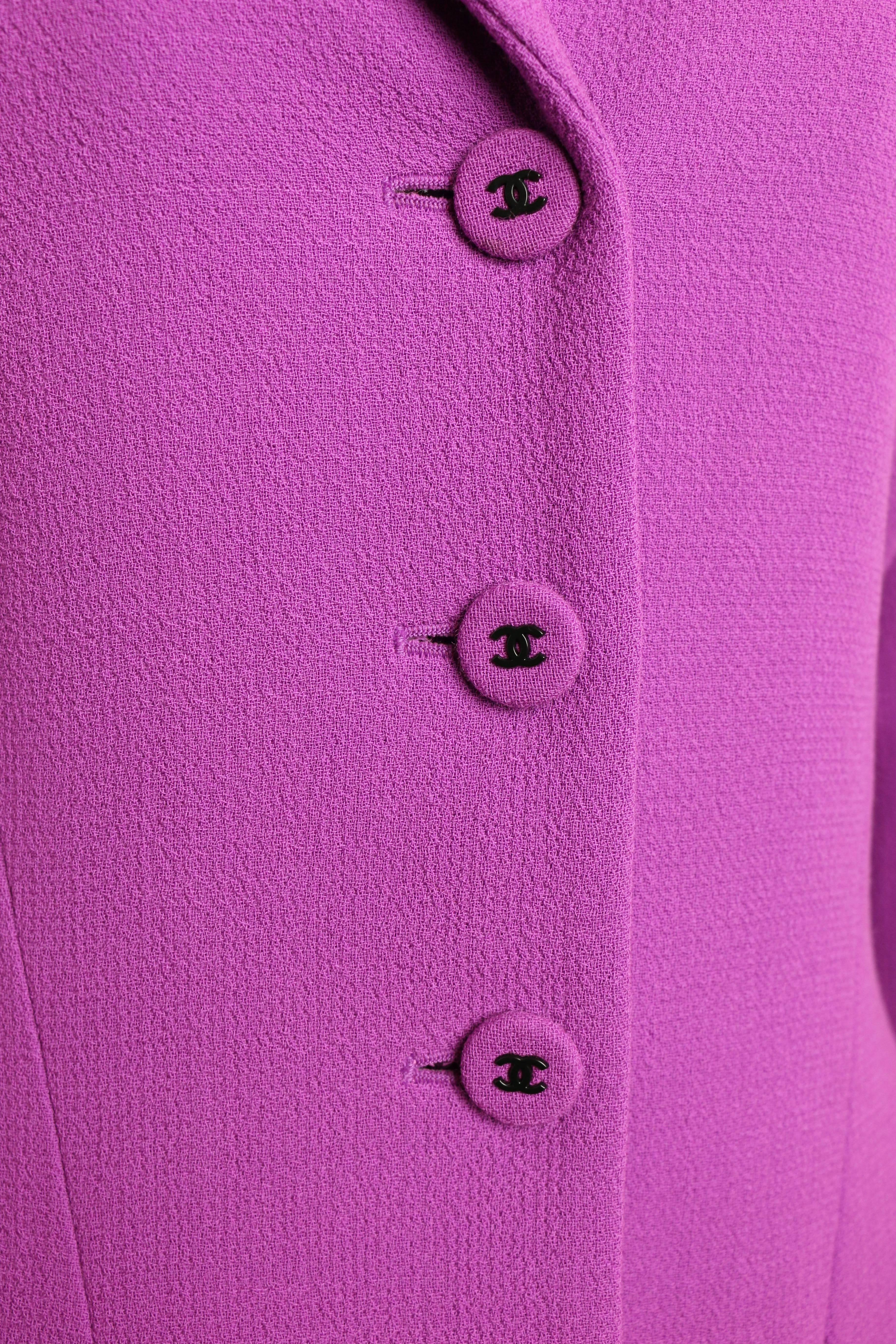 - Vintage Chanel purple boucle wool jacket from fall 1997 collection. 

- Featuring round shoulders and fully lined. 

- Three front buttons fastening and one 