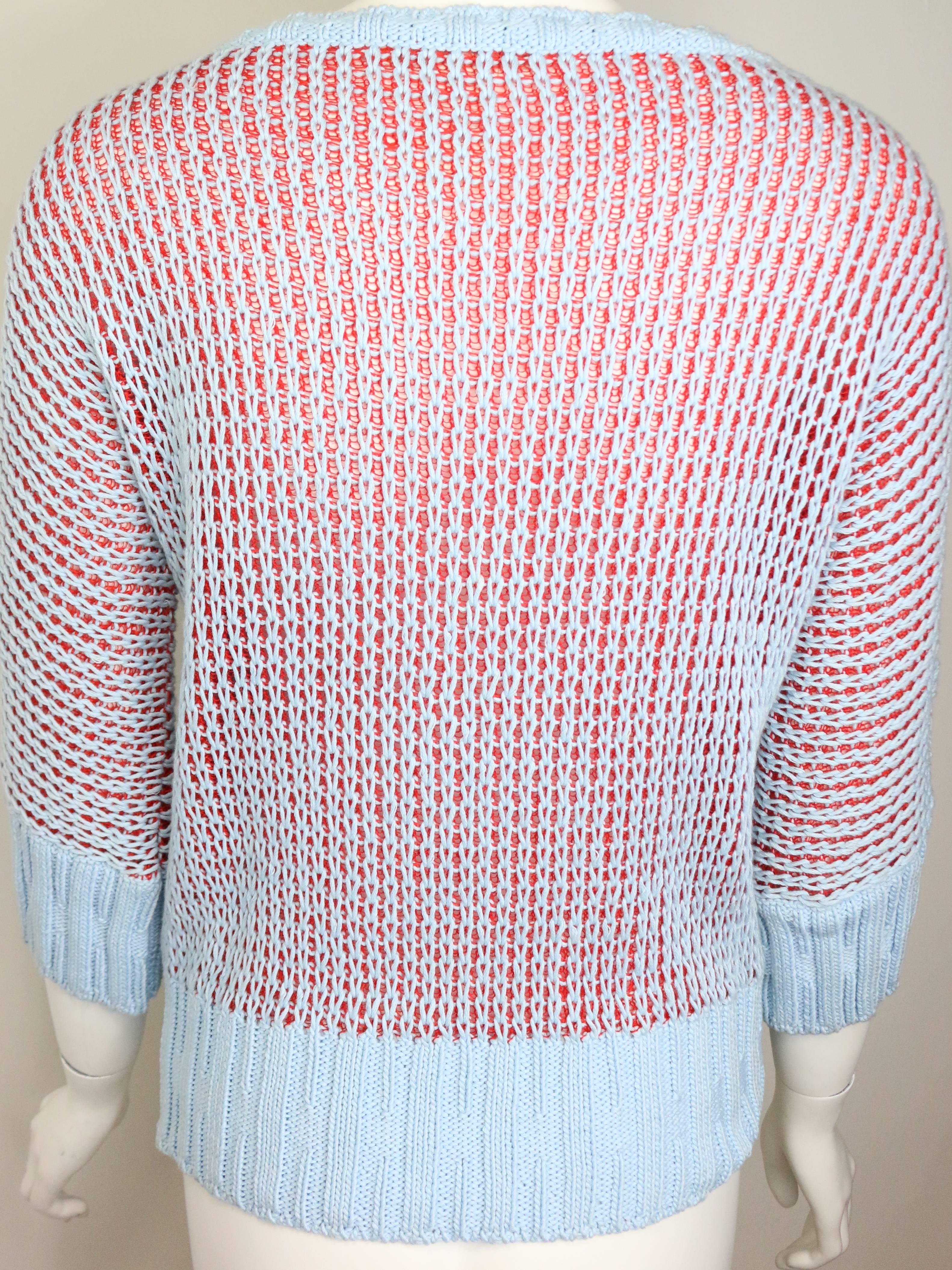 - Nina Ricci baby blue/red knitted 3/4 sleeves sweater. 

- Made in Italy. 

- 70% Cotton, 30% Linen. 

- Size FR44, USA12, IT48. 

- Shoulder: 4in I Sleeve: 19in I Height: 22in I Bust: 33in I Waist 30in. 

 