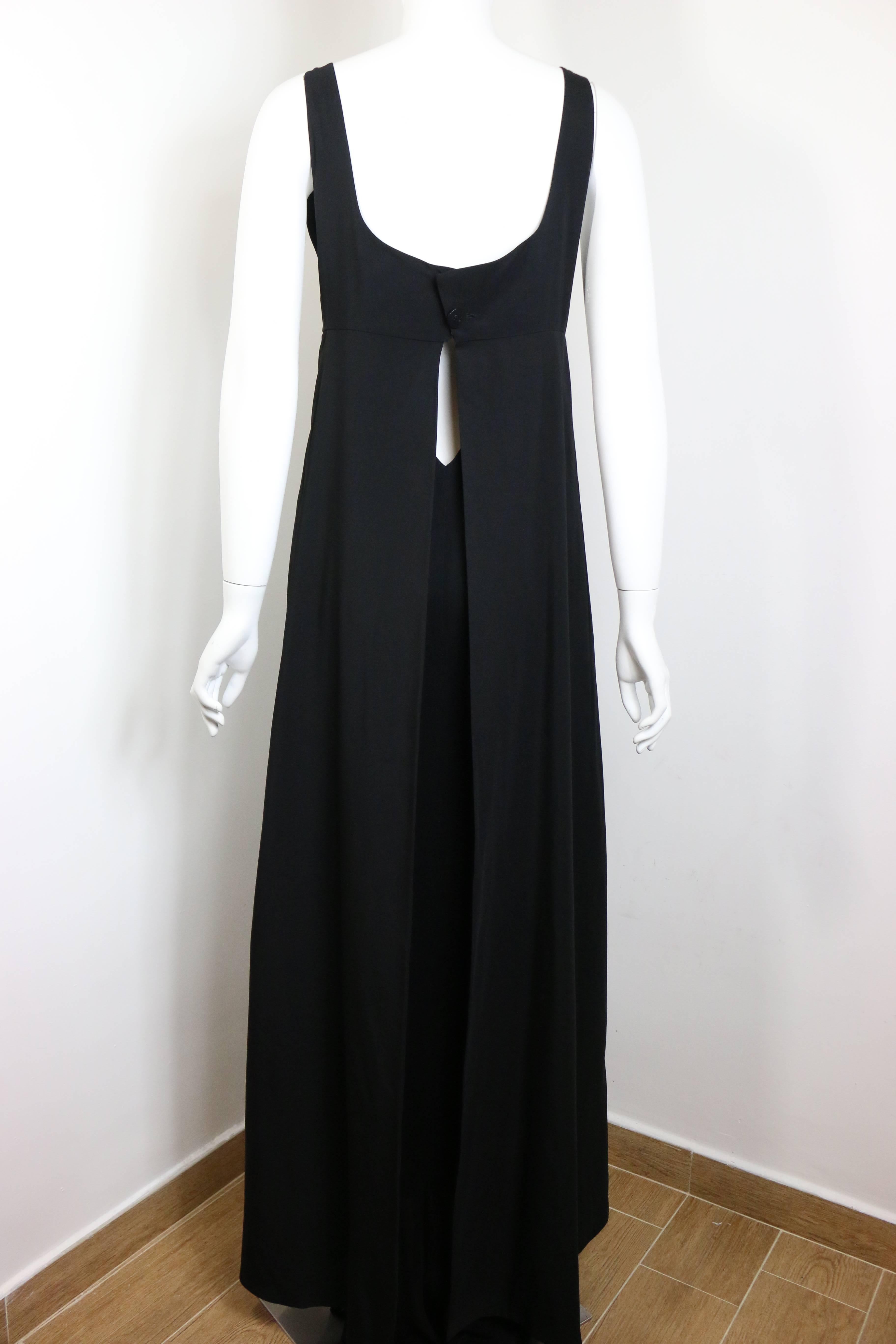 - Chanel black square neck A-Line jersey with split cut at the back maxi dress from 1998 collection. 

- Featuring two layers that first layer is wrapping around the second layer and split cut at the back. Side zipper closure, two side pockets and