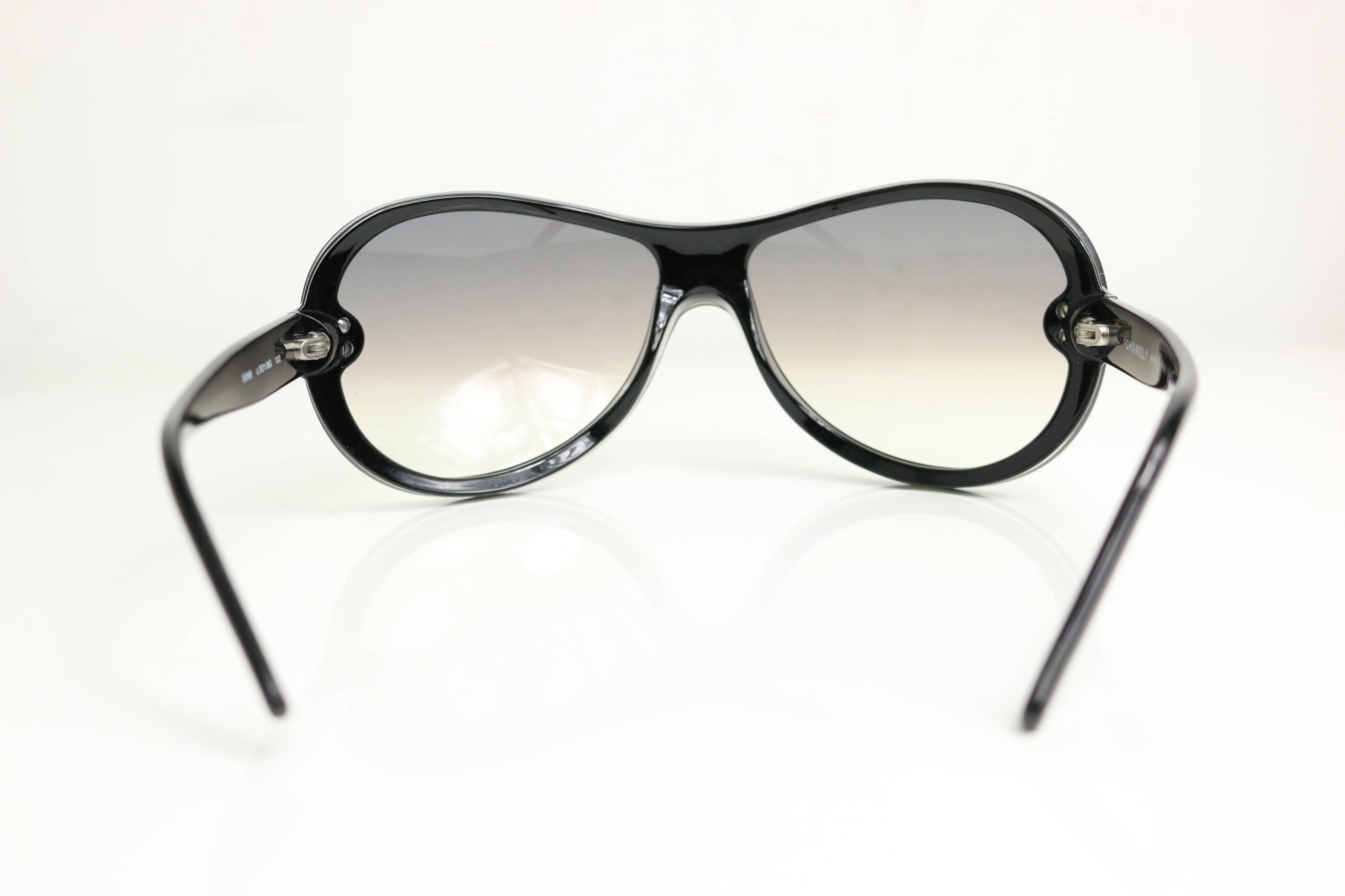 - Chanel black plastic frames and grey lenses aviator sunglasses. 

- Model no: 5066 C501/8G 120. 

