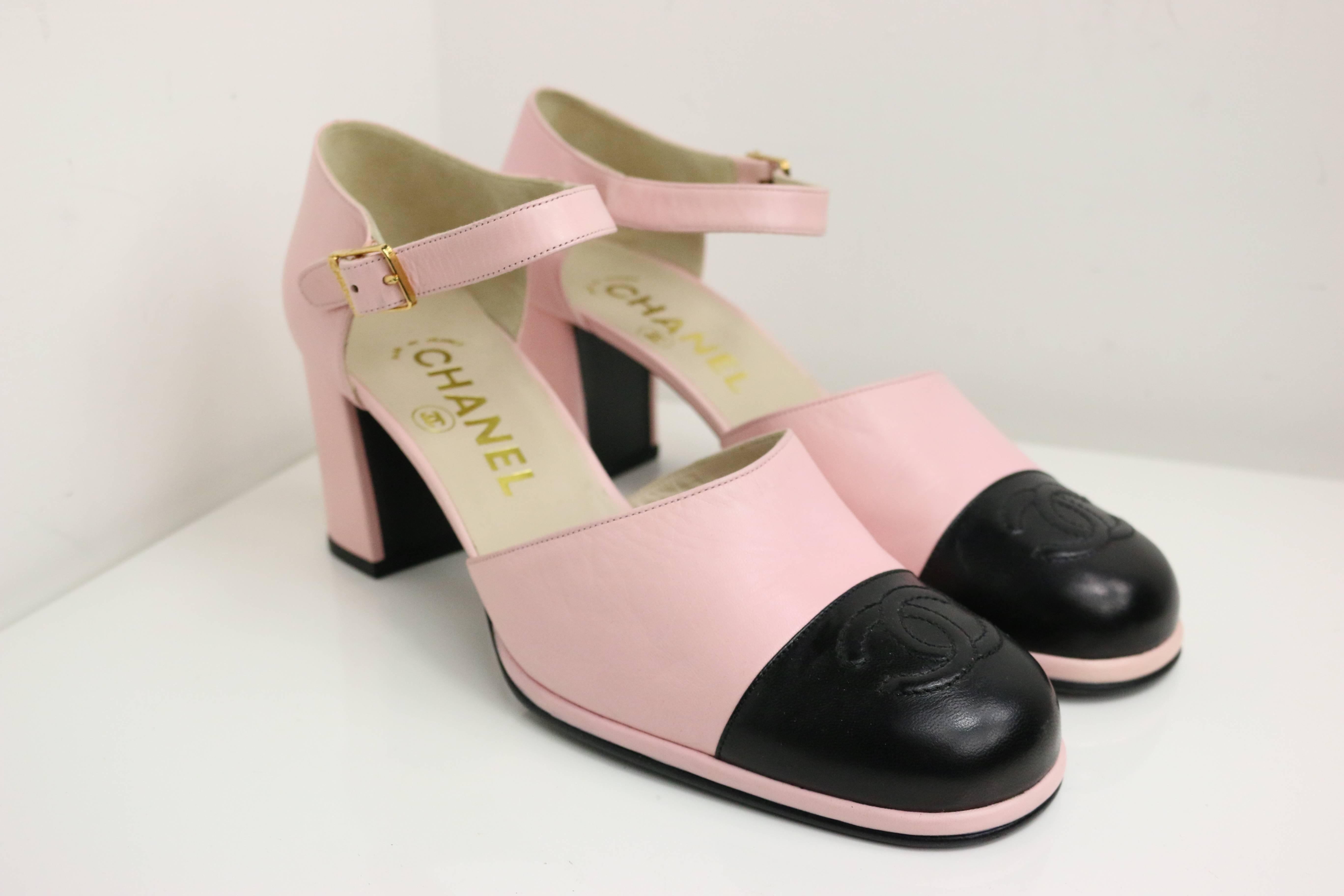 - Vintage rare 90s Chanel pink two tones pink/black leather "CC" logo strap loafers shoes. 

- Length: 9in I Height: 5in (heels 3in).  

 - Size 37.5   

- Made in France. 