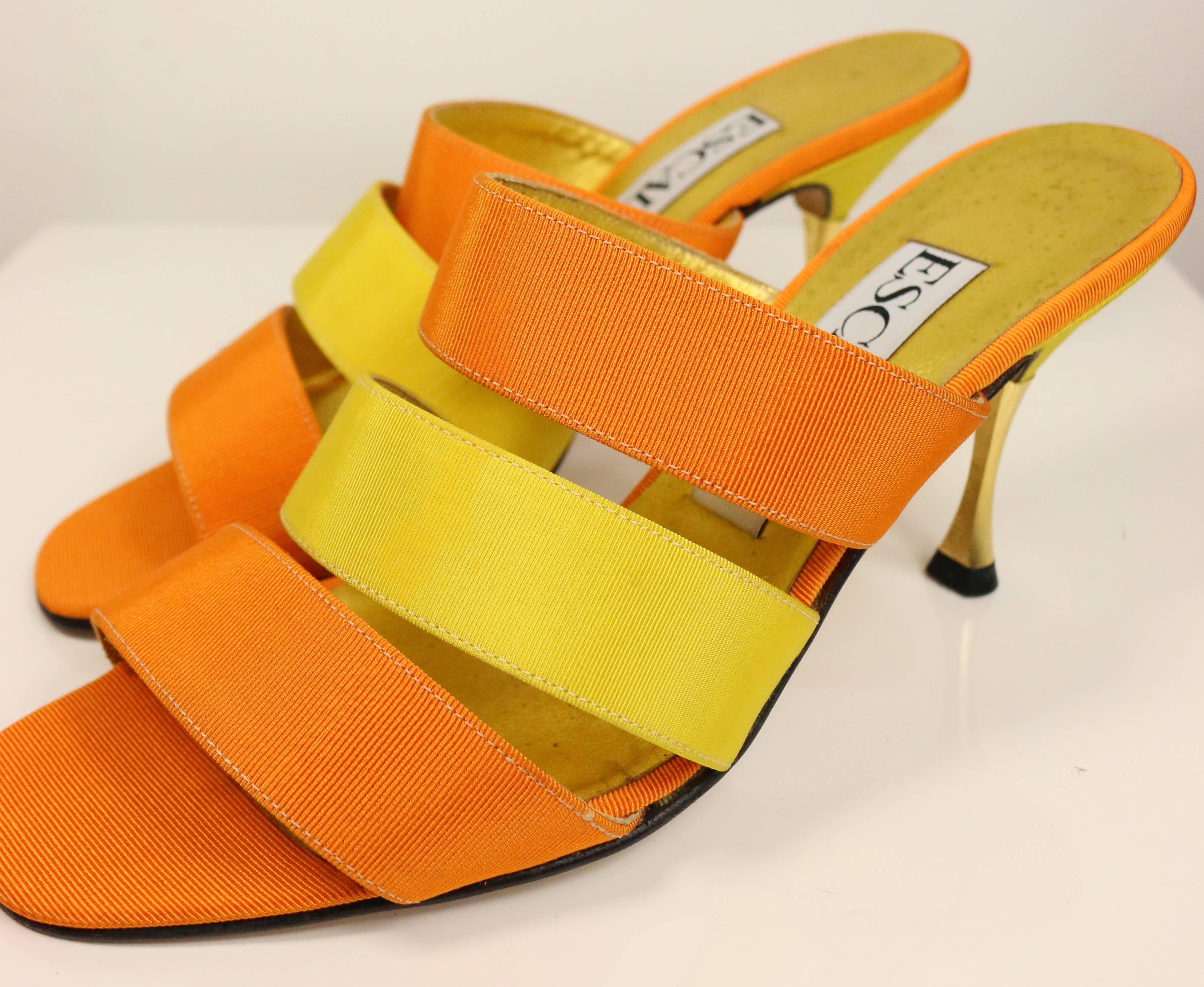 - Vintage 80s Escada bi tones orange and yellow three straps sandals gold tone heels. 

- Size 37.5

- Length: 8.5 in I Height: 3.5in I Heels: 2in 

- Made in Italy. 

- The strap fabric feels like Nylon. 

- Please note this vintage item is not