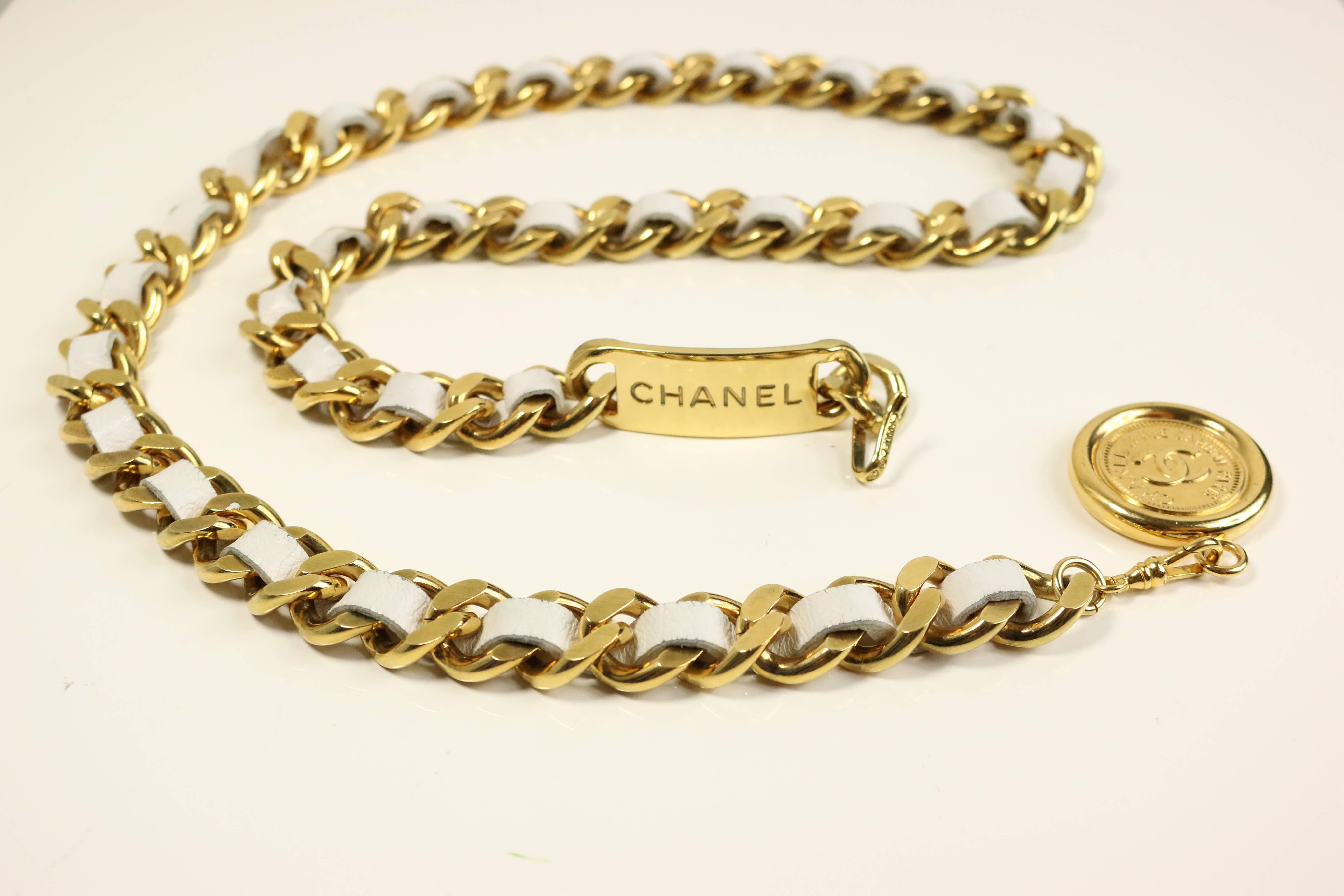 - Chanel white leather gold tone chain belt with "CC" logo medallions from 95 collection. 

- Length:30in I Height: 04in (measurement is approximate). 

- Made in France. 

- Including: Original case. 

- Please note this vintage item is
