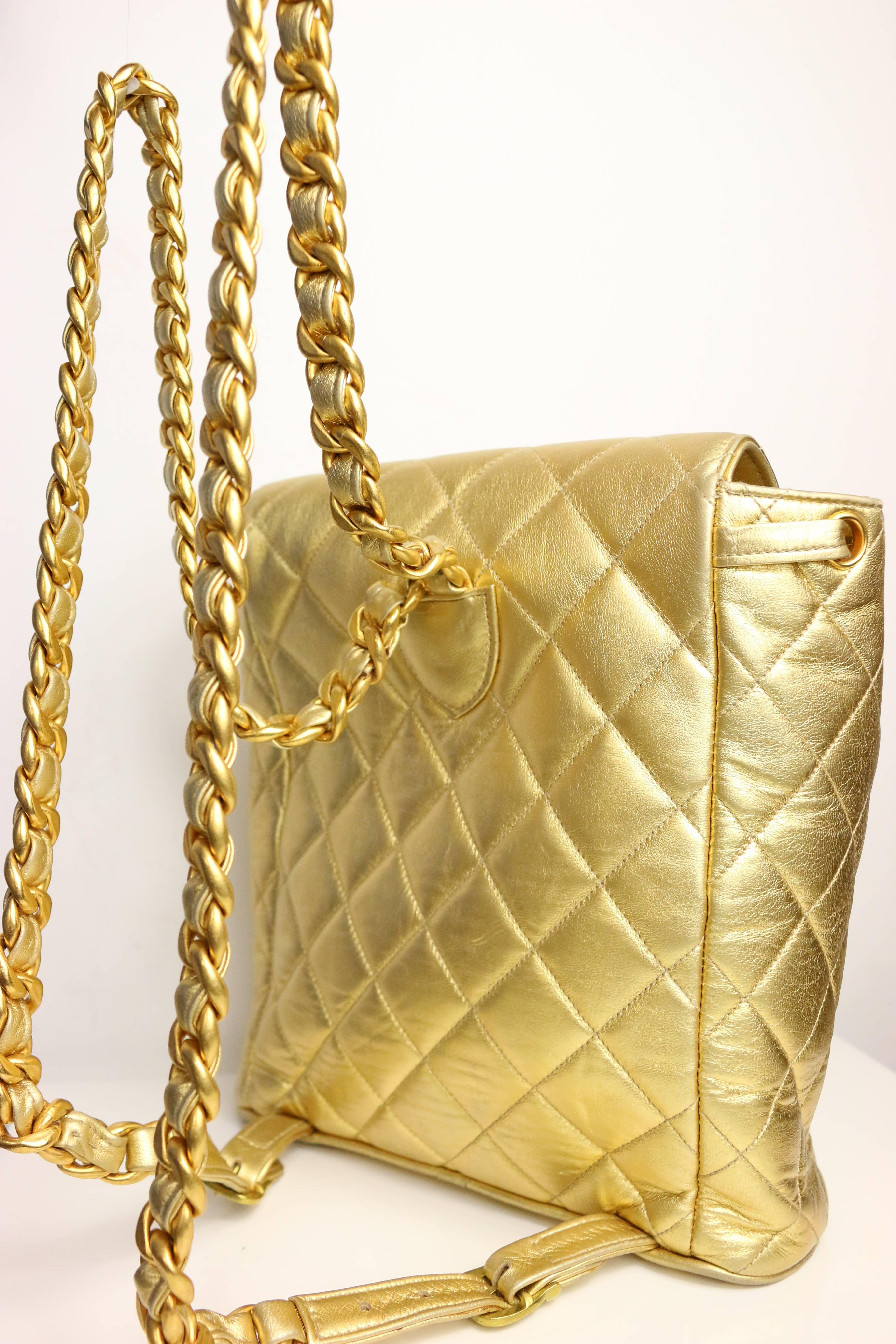 - Vintage 90s Chanel rare gold lambskin backpack bag. 

- W: 22cm (8.66 inches) x H: 23cm (9.05 inches) x D: 10cm (3.93 inches). 

