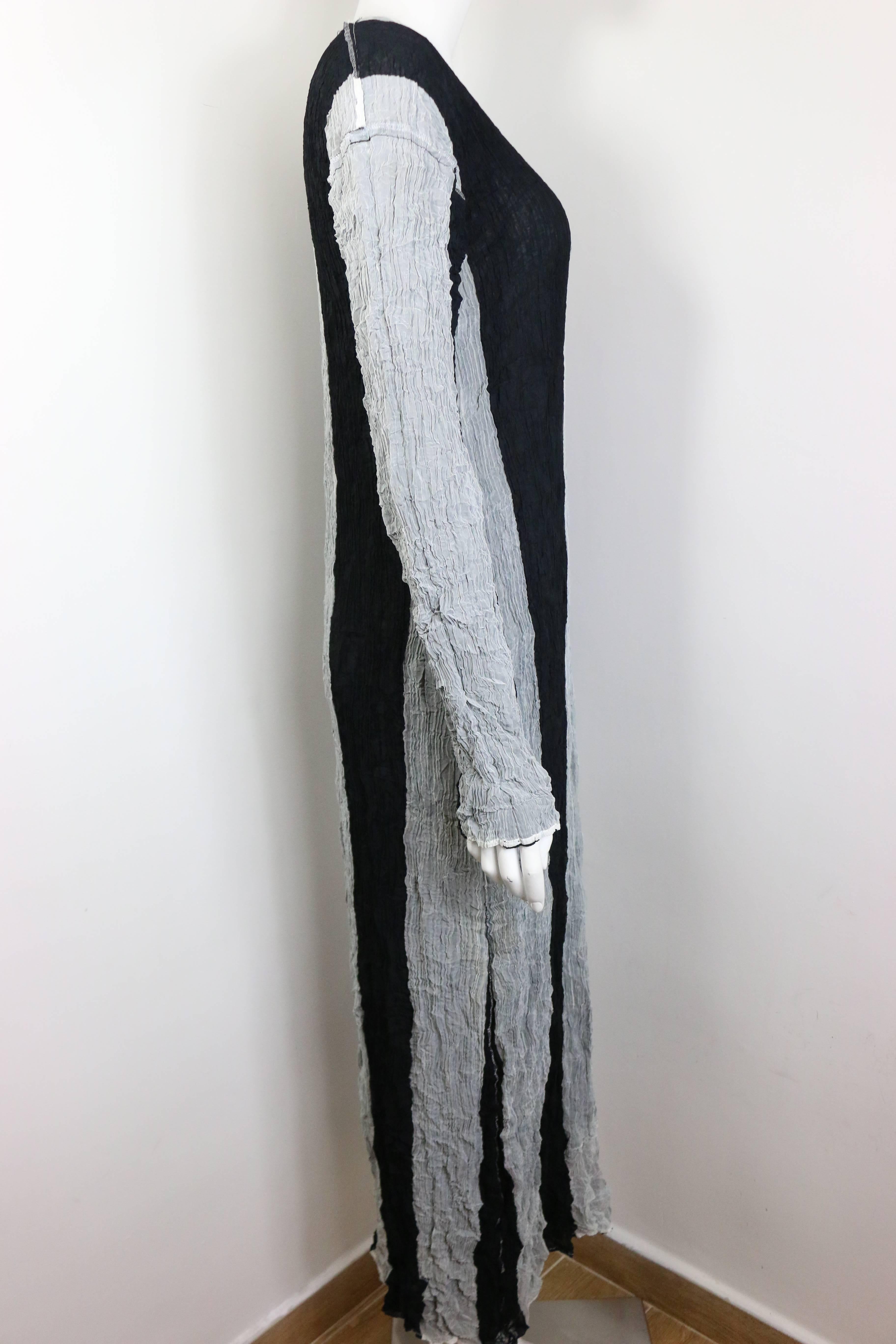 - Vintage Issey Miyake black and grey striped pleated long dress. 

- There is no size tag and name tag but it is around size Japan M. 

- Height: 52in, Bust: 32in, Waist, 26in (measurements are approximate). 
