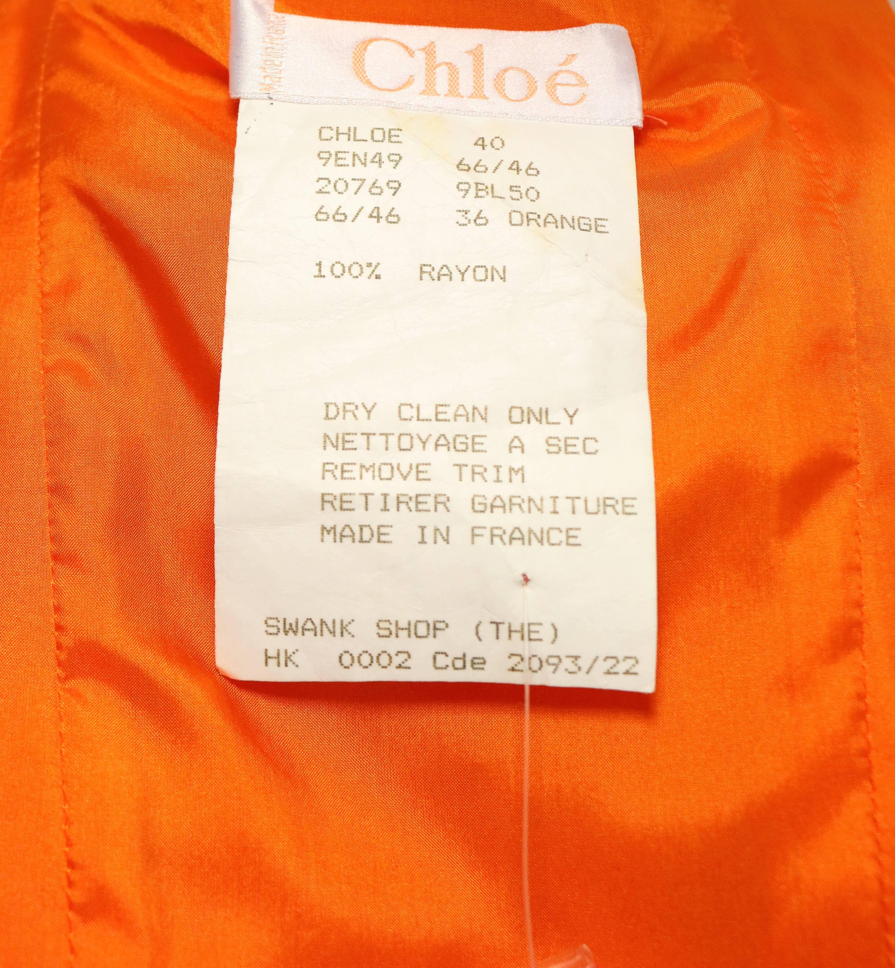 Chloé - Ensemble gilet et jupe court orange avec boutons en forme d'ampoule  Pour femmes en vente