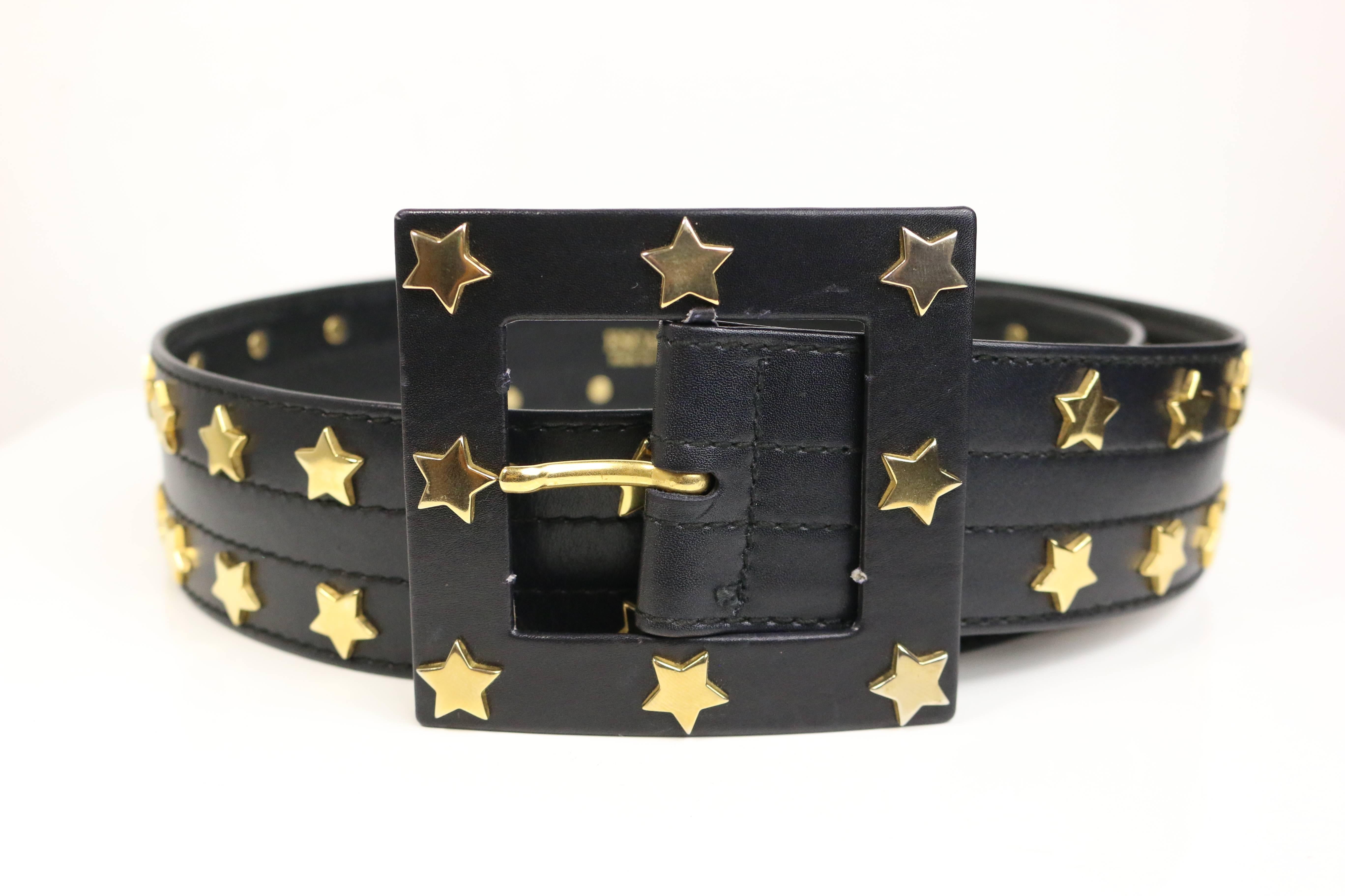 - Vintage 80s Escada black leather with gold star studs belt. 

- Length: 32in, Height: 2in. 

