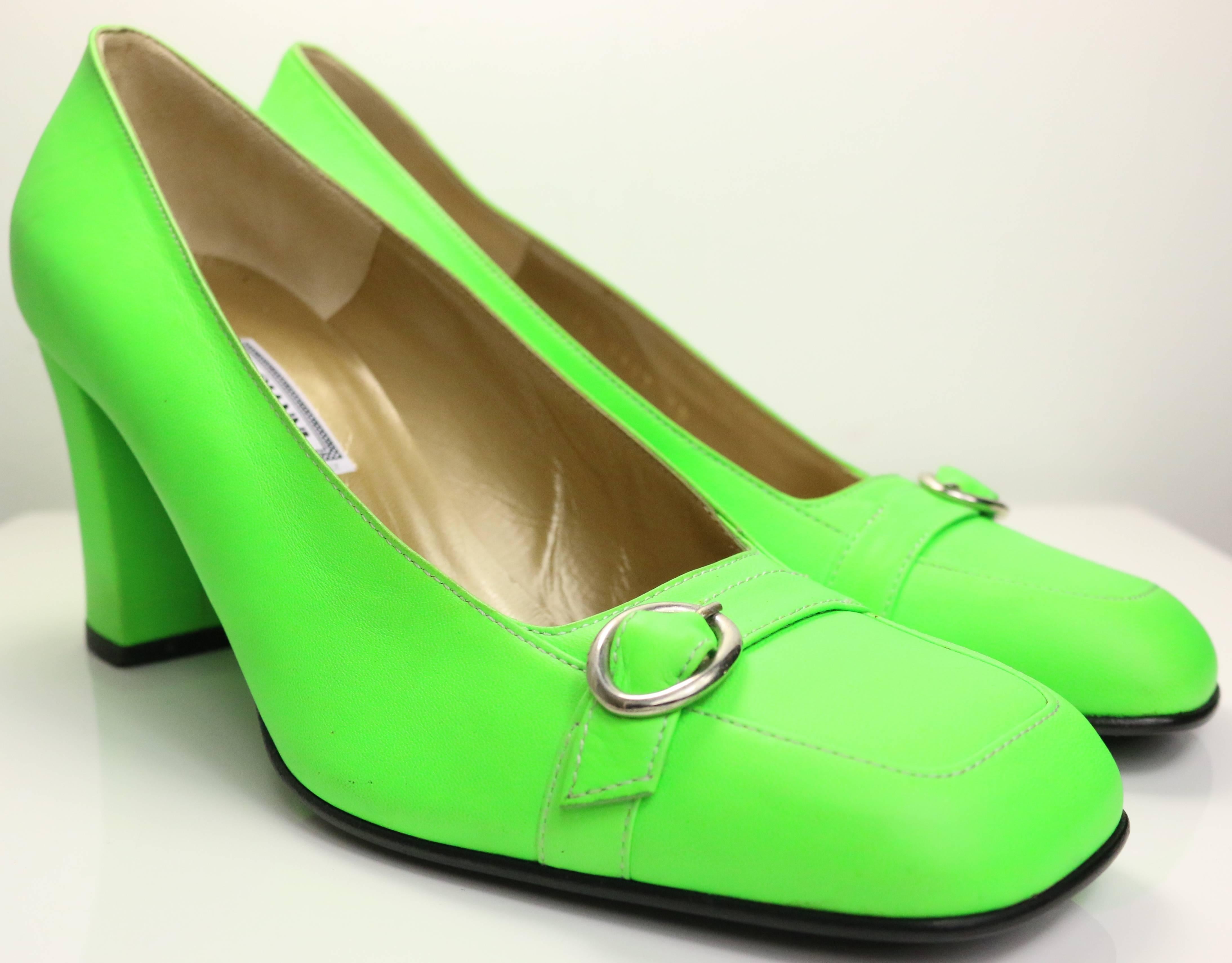 - Vintage 90s Gianni Versace neon green leather square toe heels with buckle details in front. 

- Size 38. 

- Made in Italy. 

- Serial number is 2953 5123 38. 

- The robber soles on the heels have been replaced from the original one. 