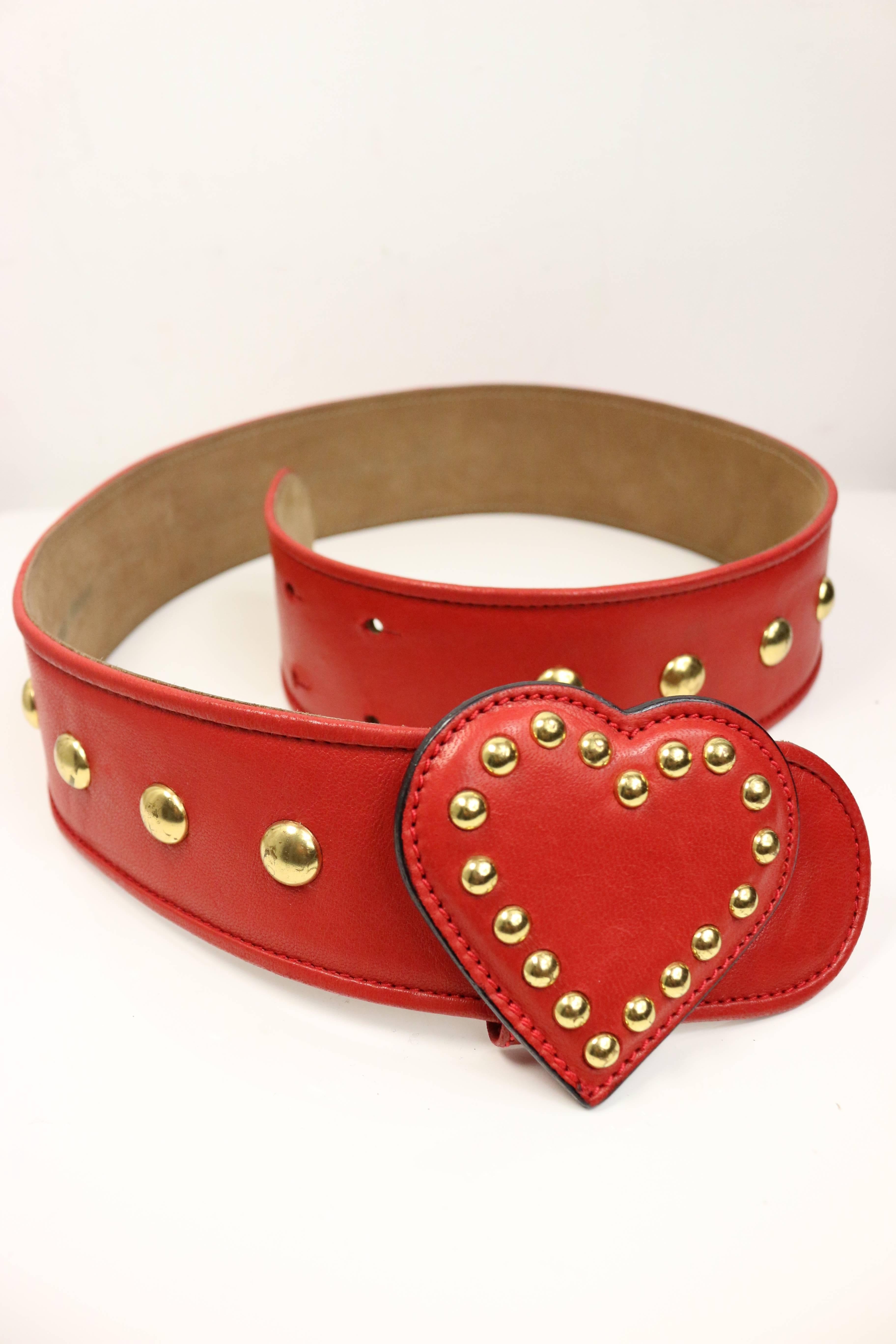 - Vintage 90s Moschino red leather with gold studded heart belt. Made by Redwall, no 401098. 

- Made in Italy. 

- Around 24 to 26 inches Waist. 
