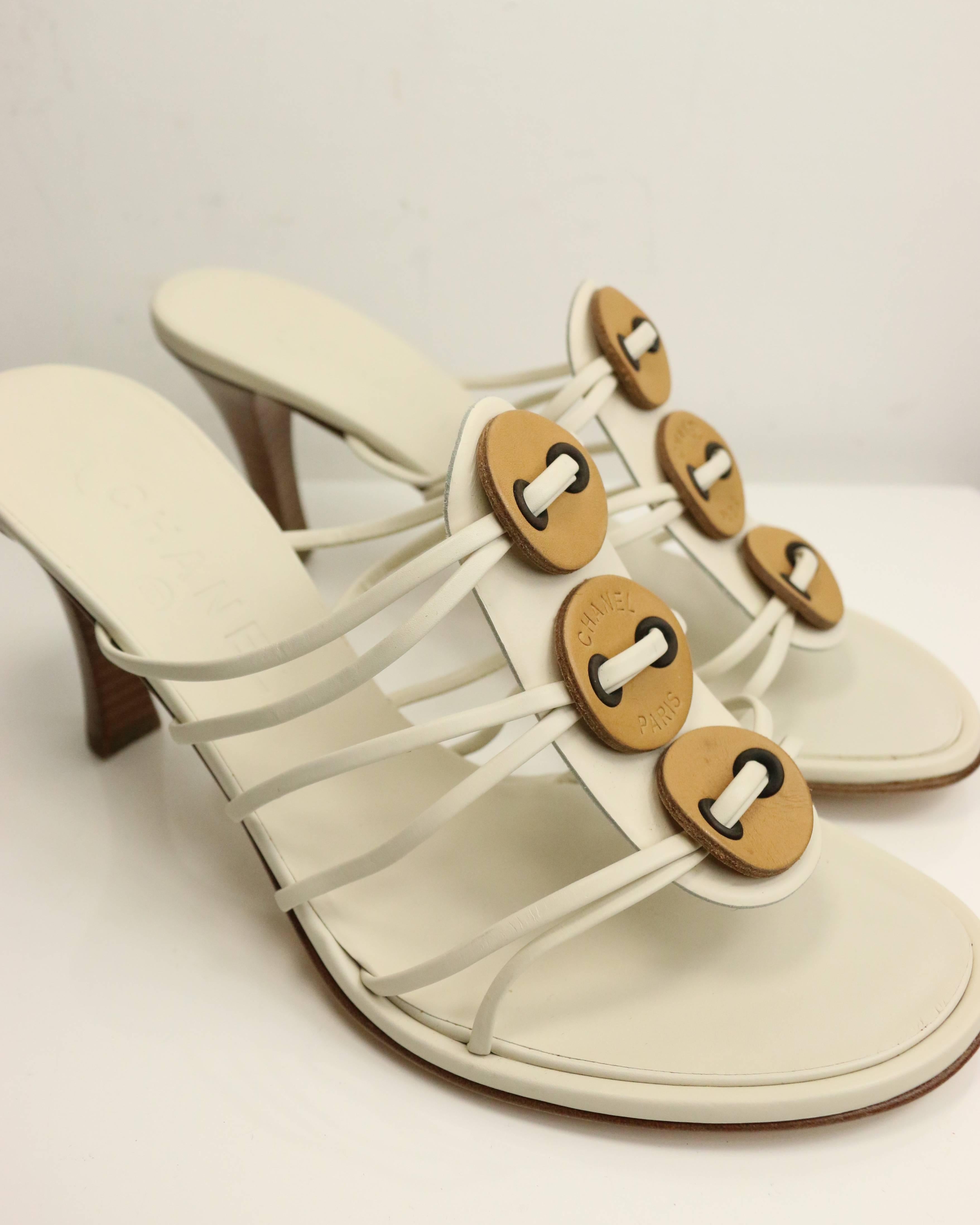 - Vintage 90s Chanel sand beige open toe sandals. 

- Leather quilted sole. 

- Size 38.5. 

- Includes: dust bag. 
