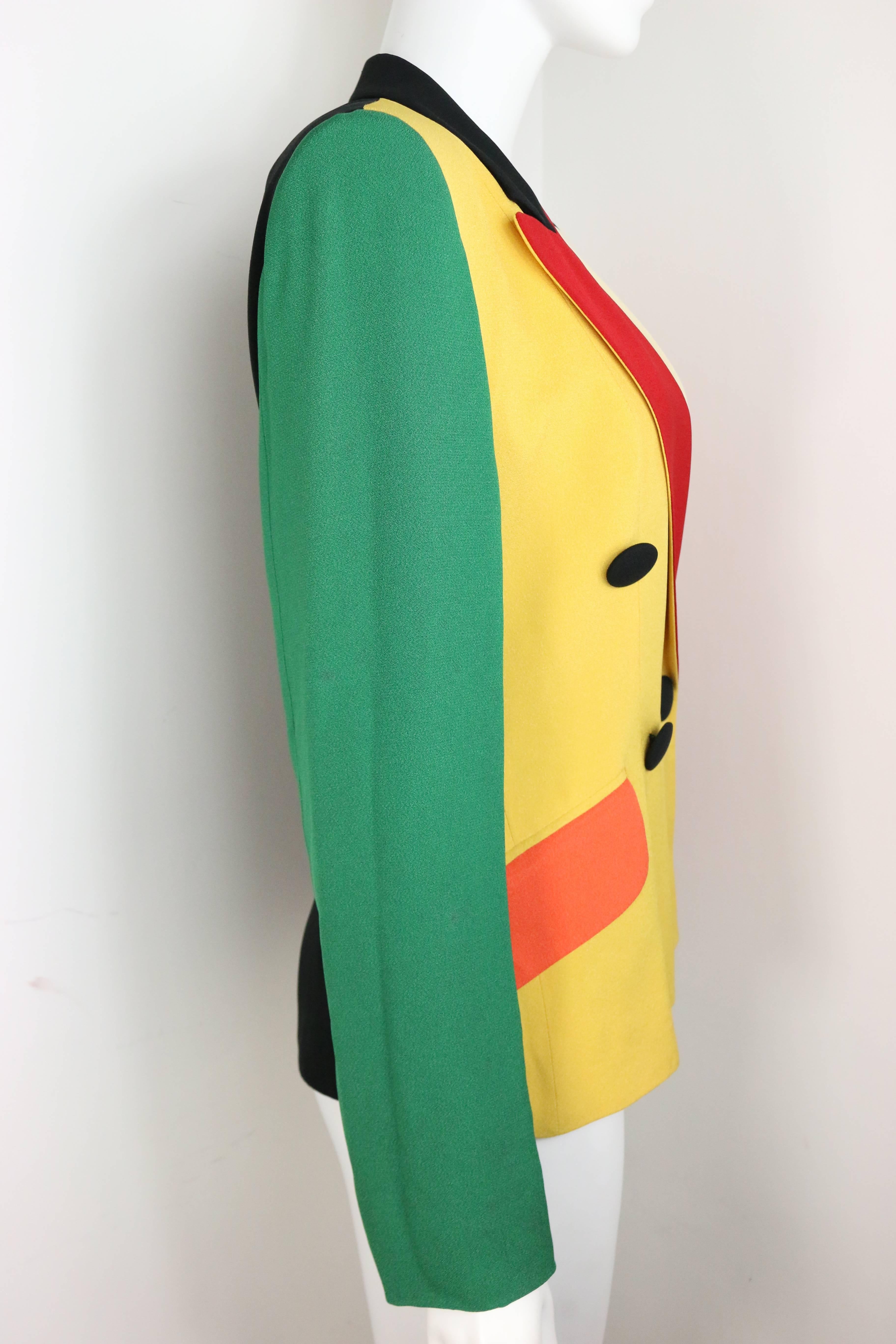 - Vintage 90s Moschino cheap and chic colour blocked (cream, black, red, orange, yellow and forest green) double breasted jacket. This is a one of a kind jacket with playful and fun Moschino's signature. 

- Featuring two flaps pockets in colour