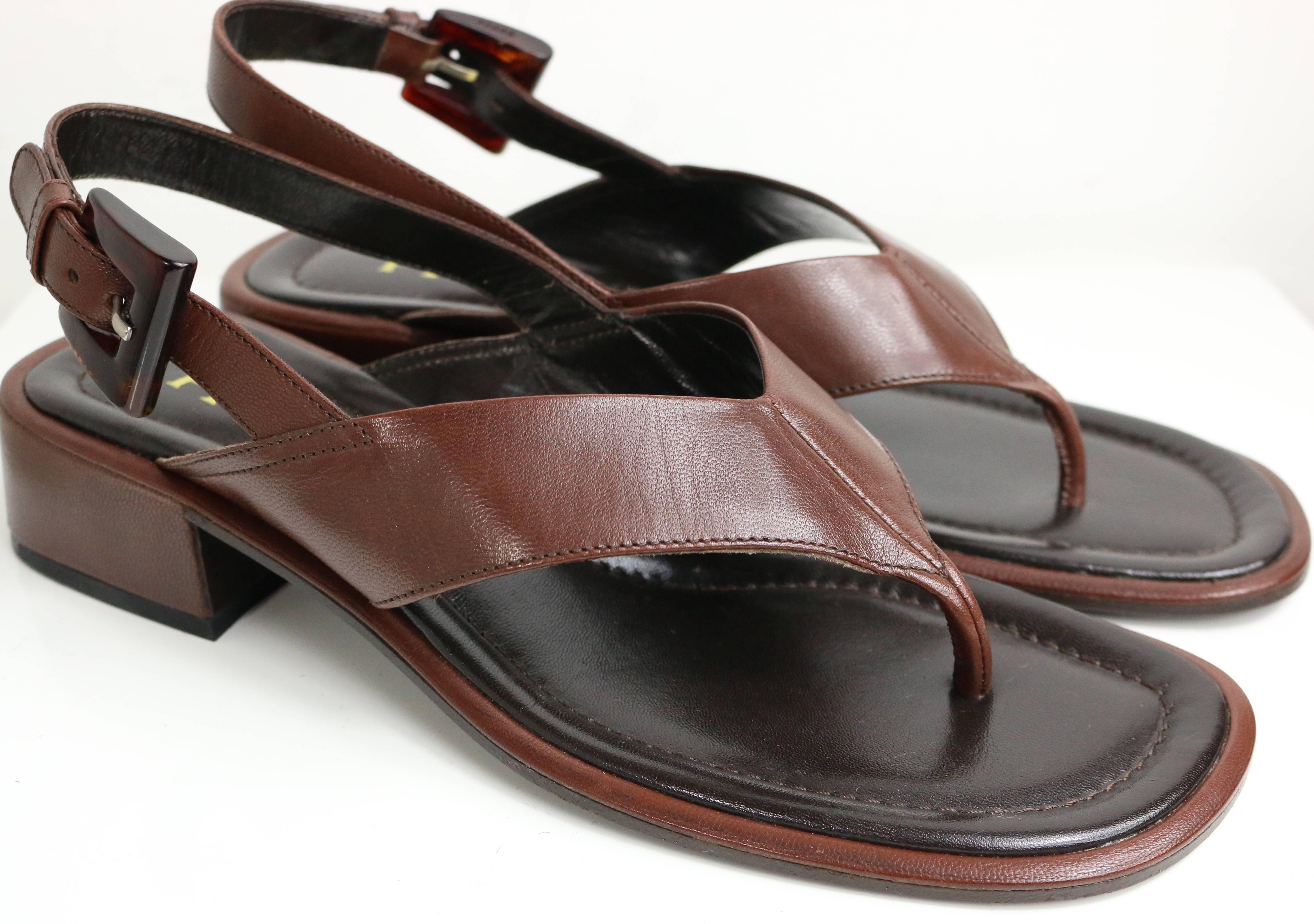 - Vintage 90s Prada brown leather slingback sandals. 

- Size 37.5. 

- Made in Italy. 
