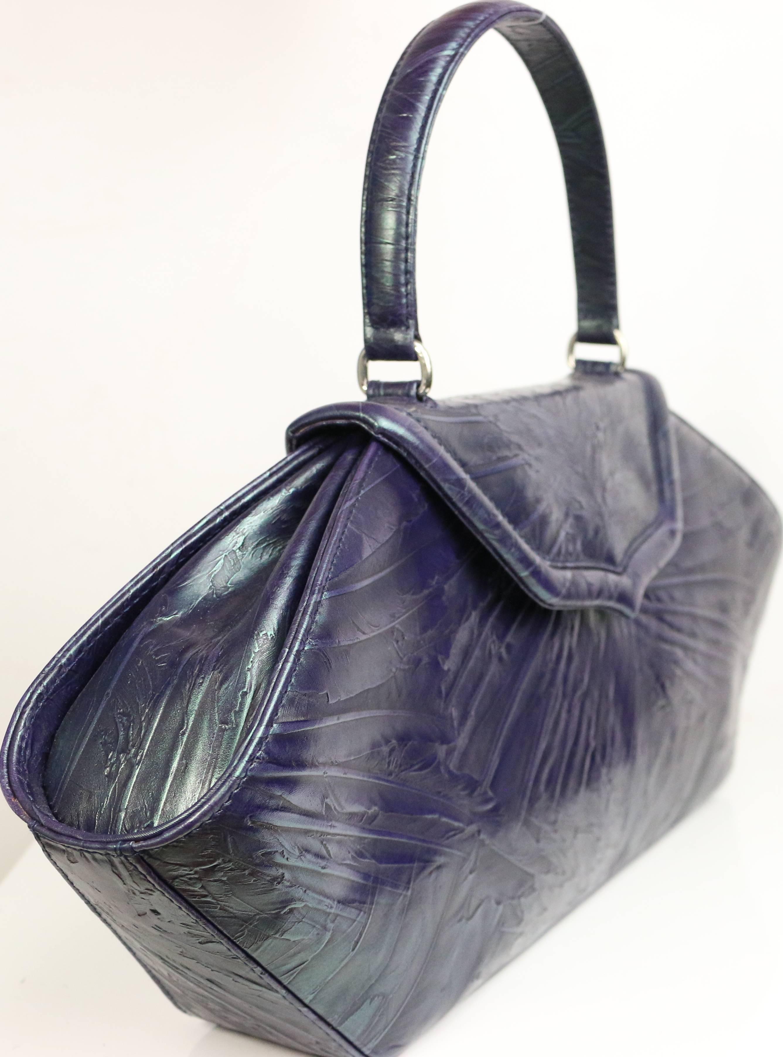 - Vintage 90s Philip Treacy octagon leather handbag. 

- Length: 16 inches. Height: 11.5 inches. 

- Made in London 