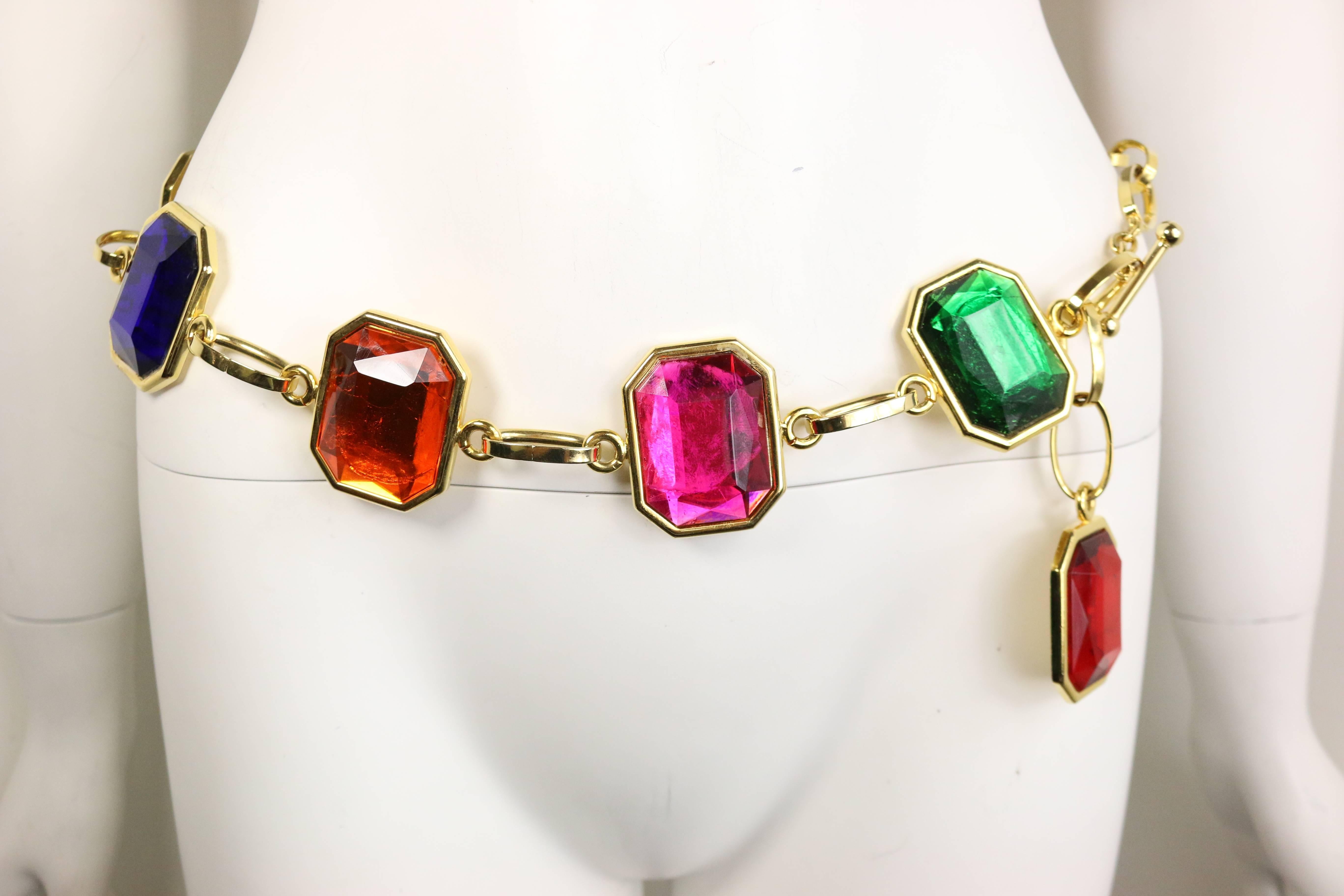 - Vintage 80s octagon multicoloured(red, orange, green and pink) gold toned link belt. 

- Featuring gold tone on the other side. Can use it as a necklace and reserve it as well. 

- It is heavy weight. 

- Vintage condition. 

- Length: