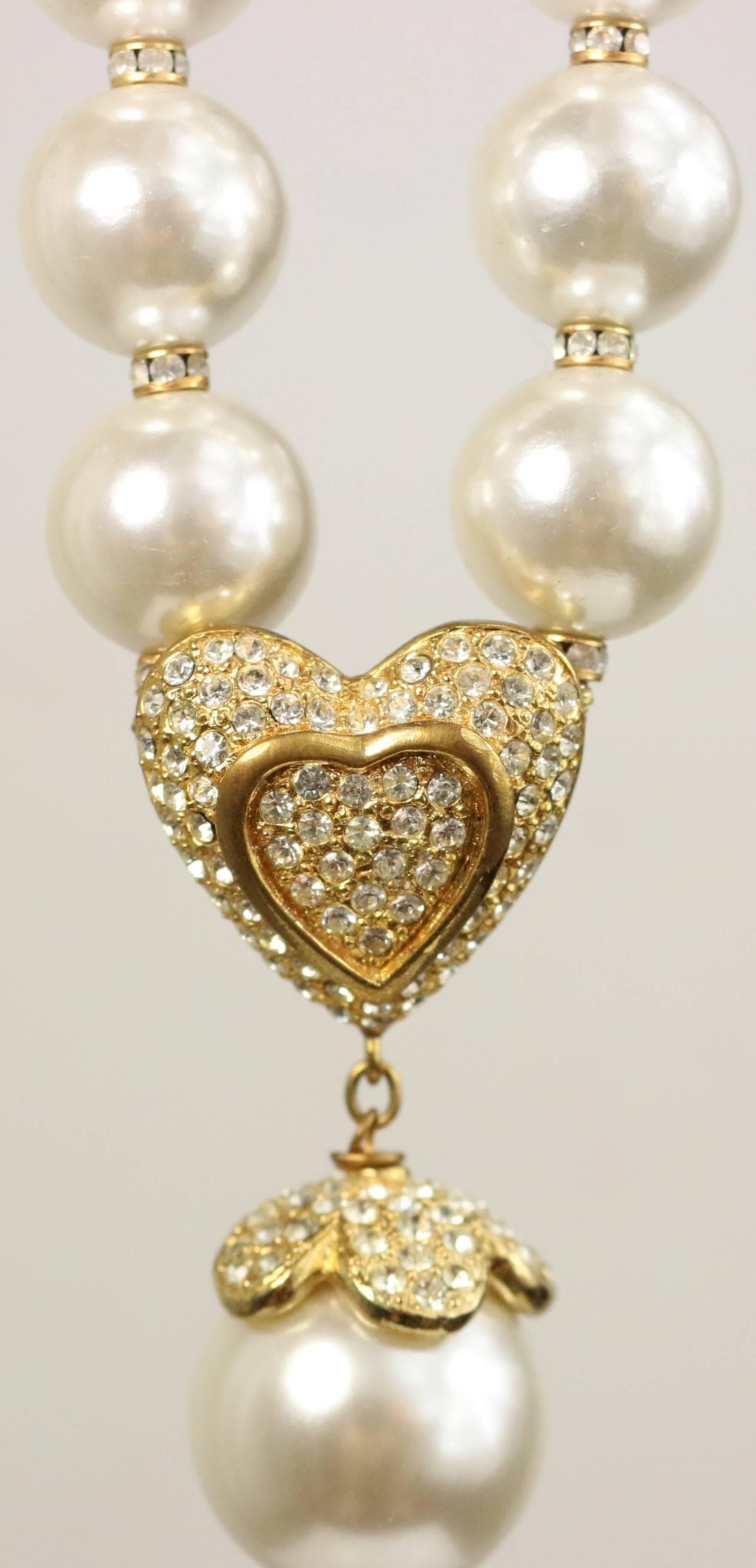 - Vintage 80s Escada gold toned rhinestone heart shaped and drop clover faux pearls necklace. 

- Length: 15 inches long. Height with the drop clover: 2 inches. 

