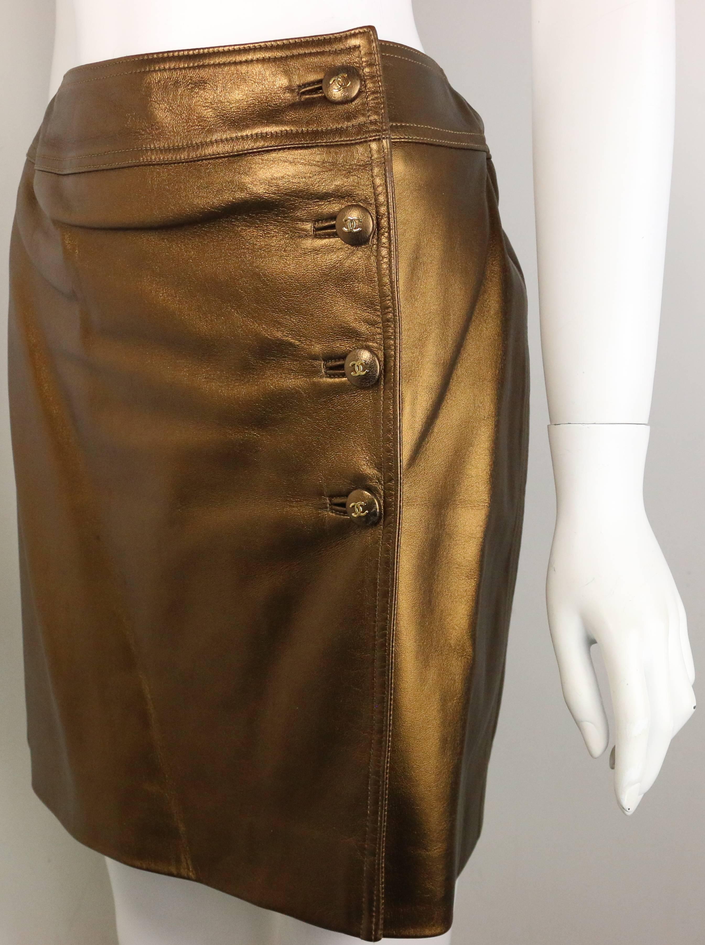 - Chanel bronze metallic lambskin leather wrap skirt from Fall 1996 collection. 

- Featuring four bronze metallic 