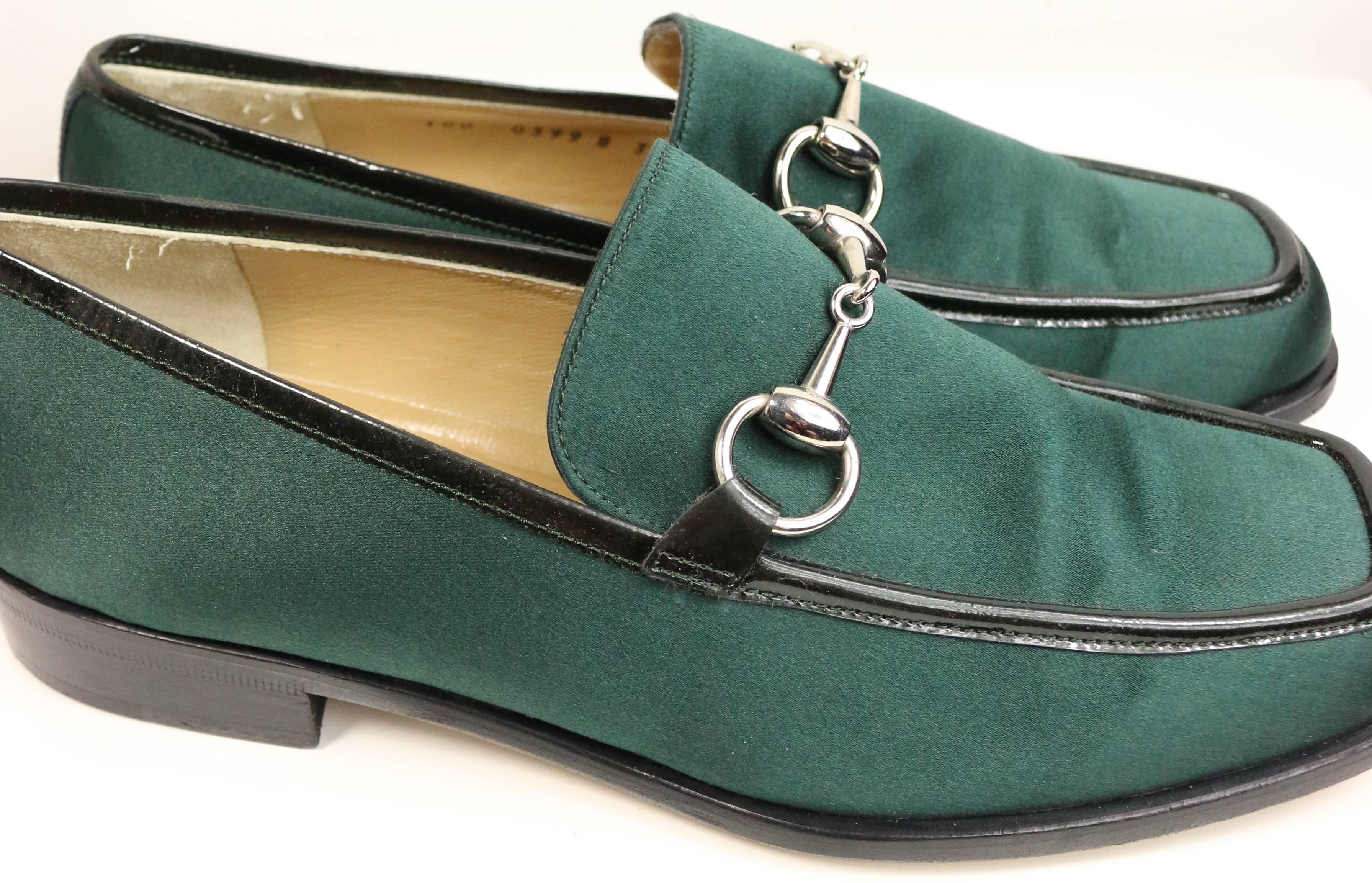 - Fall 1996 Gucci by Tom Ford classic green satin with signature silver buckle and black patent piping trim loafer. It is a true classic!!! 

- Size 37. 

