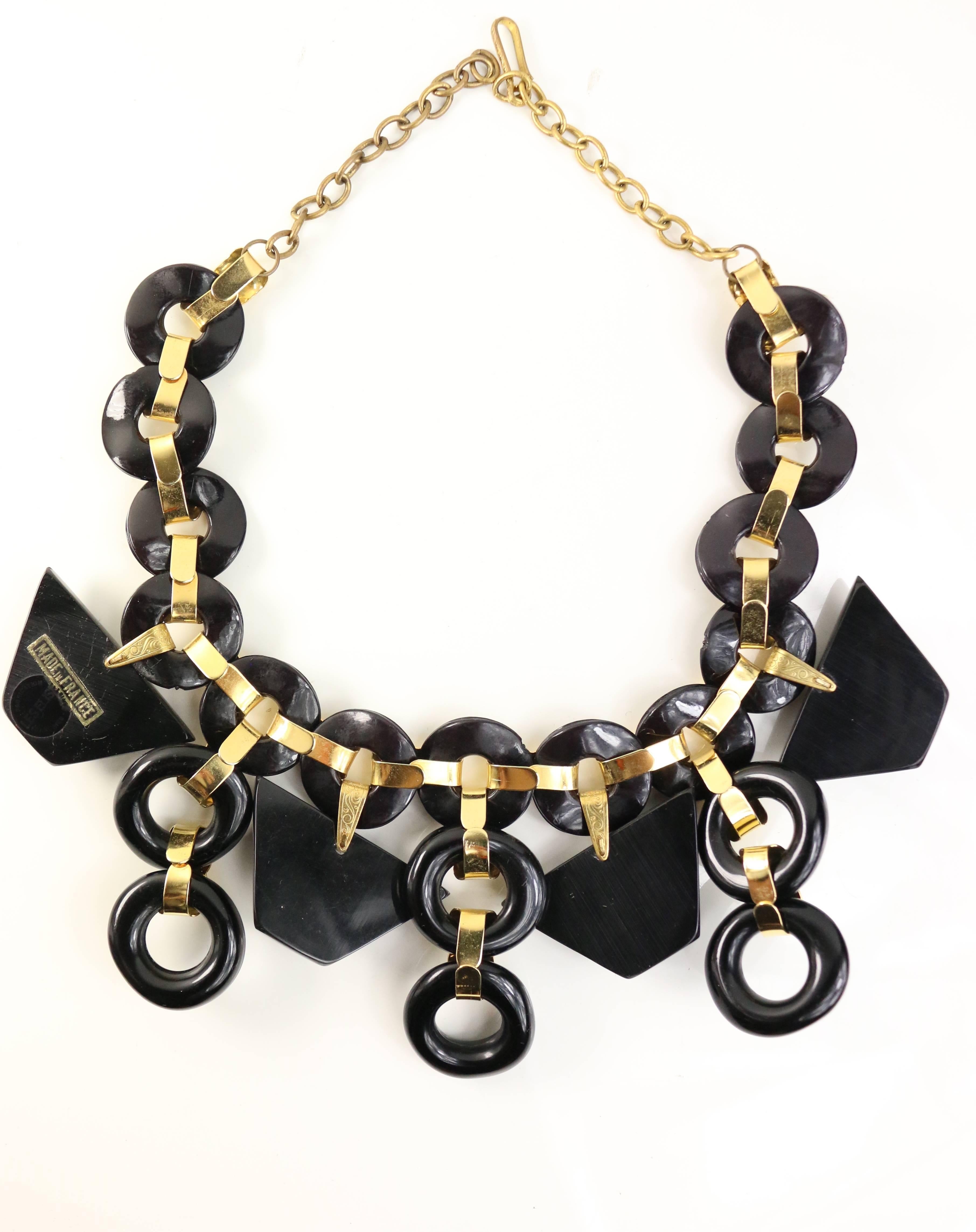 - Vintage 90s Les Elise Paris black with gold chain link necklace. 

- Featuring black drop octagon and round shapes. 

- Made in France. 

- Long: 17 inches. Height: 11 inches. 

