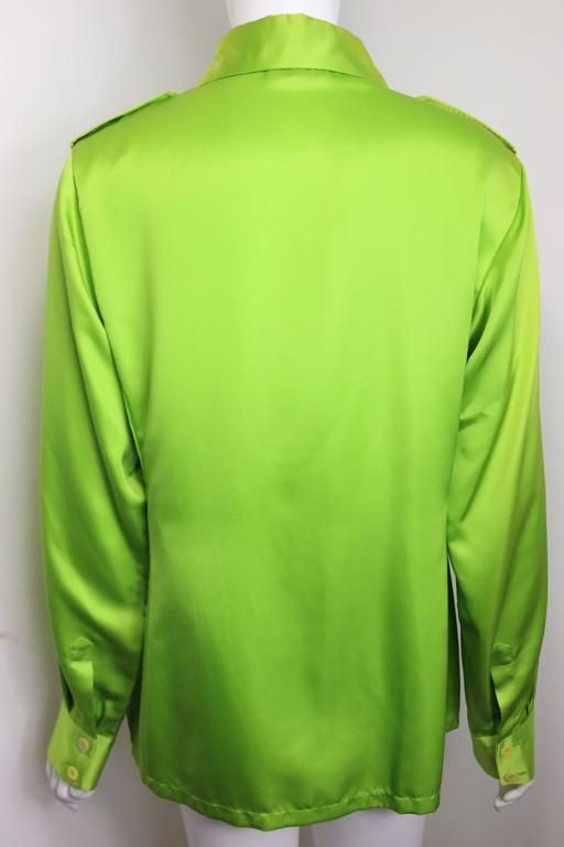 - Gucci by Tom Ford green satin silk shirt from his debut fall 1995 collection. This collection really marks his name in the fashion industry. Tom Ford redefined what sexiness is!!!

- Featuring epaulettes on the shoulders with 