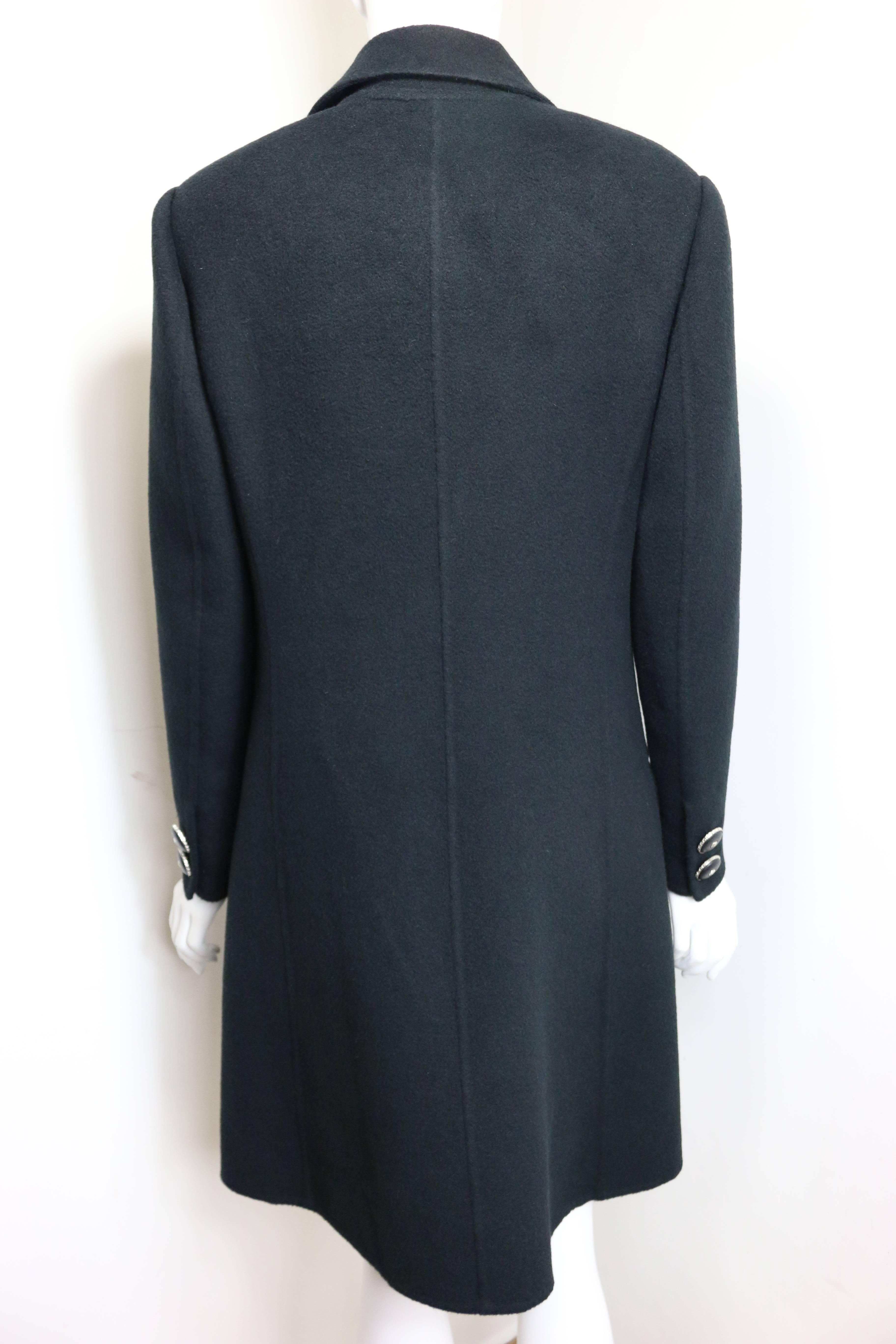 - Vintage 90s Gianni Versace Couture black (rabbit and goat) wool long coat. This is a classic straight cut and collectable item for winter. 

- Featuring six front black leather silver medusa buttons. Two black leather silver medusa buttons on