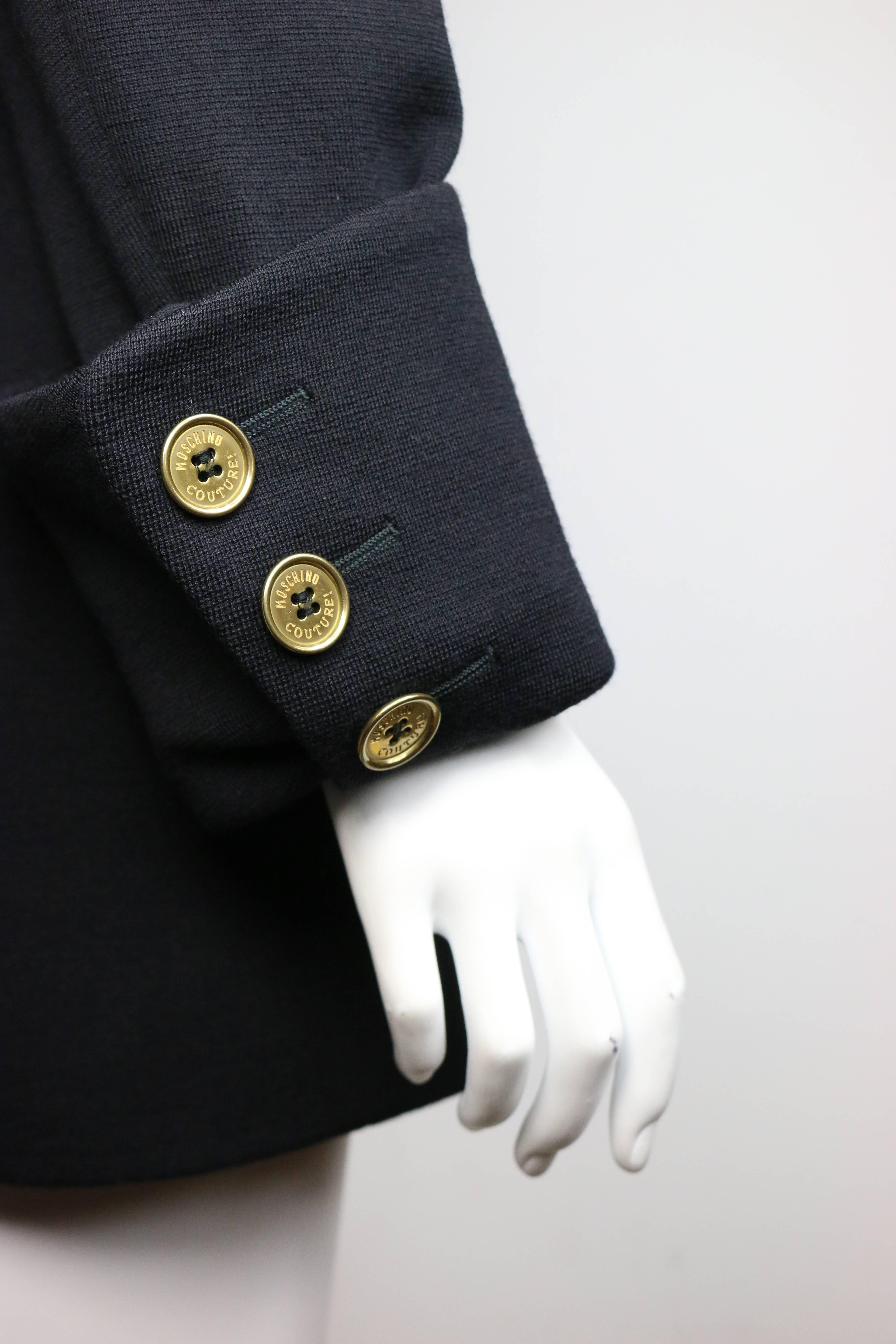 black double breasted jacket with gold buttons
