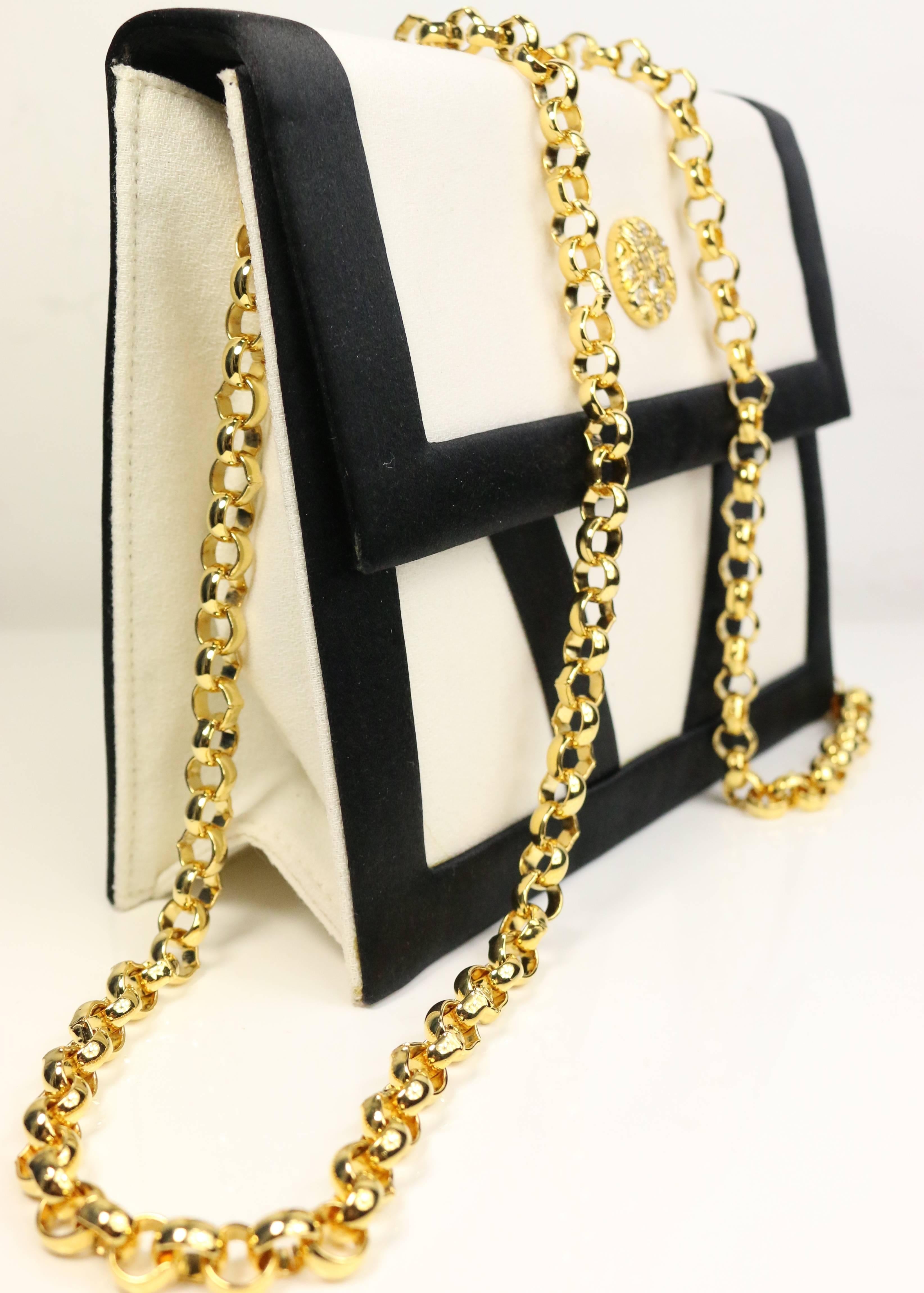 - Vintage 80s Escada white wool with black satin piping trim gold chain boxy evening bag. Featuring a gold toned crystal rhinestones stud. You can take away the gold chain and carry it as a boxy clutch. Its very unique and elegant for an evening out