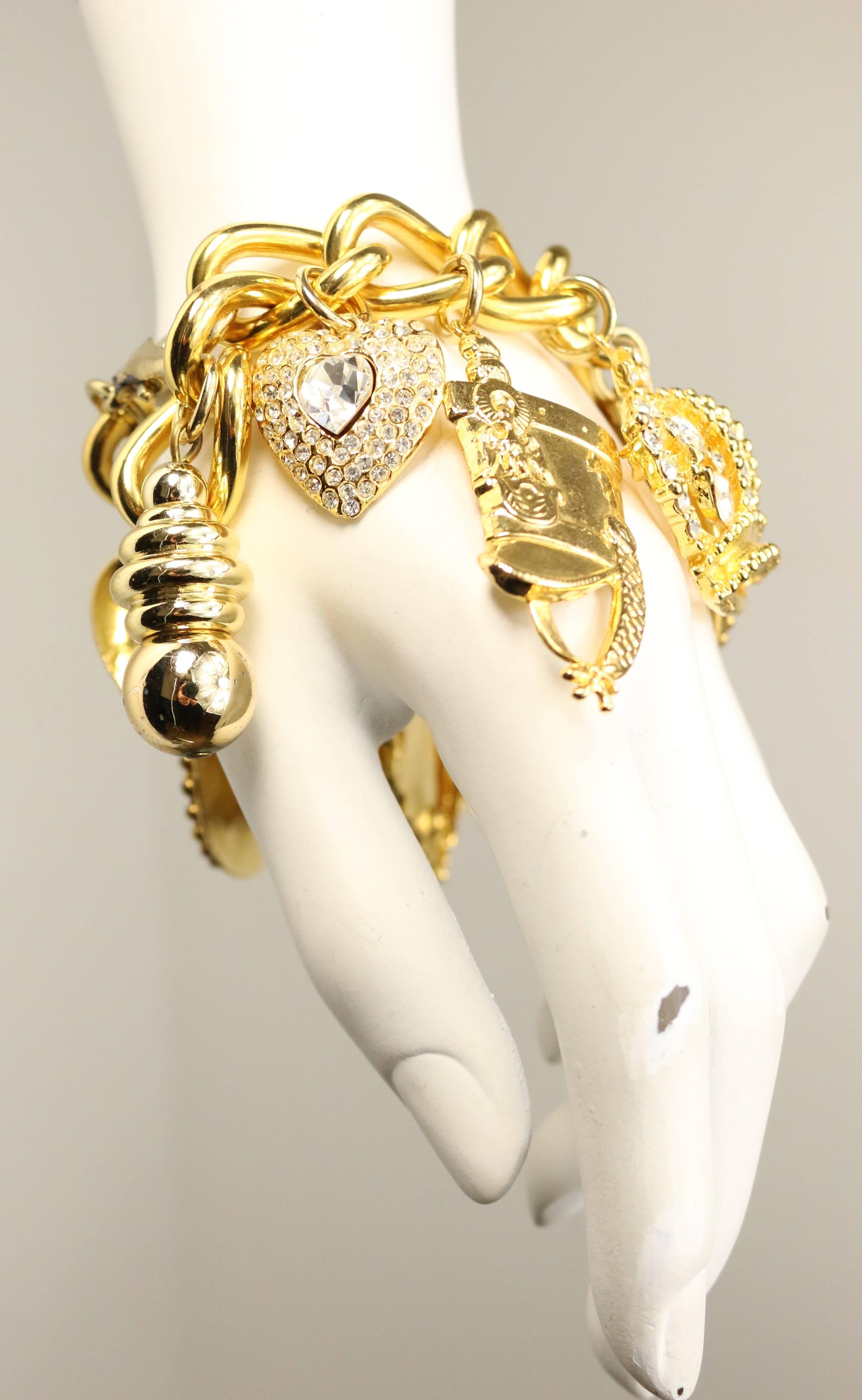 - Vintage 80s gold chain charms (crystal rhinestones hearts, crowns, key lock, etc... ) bracelet. Unique piece!!!

