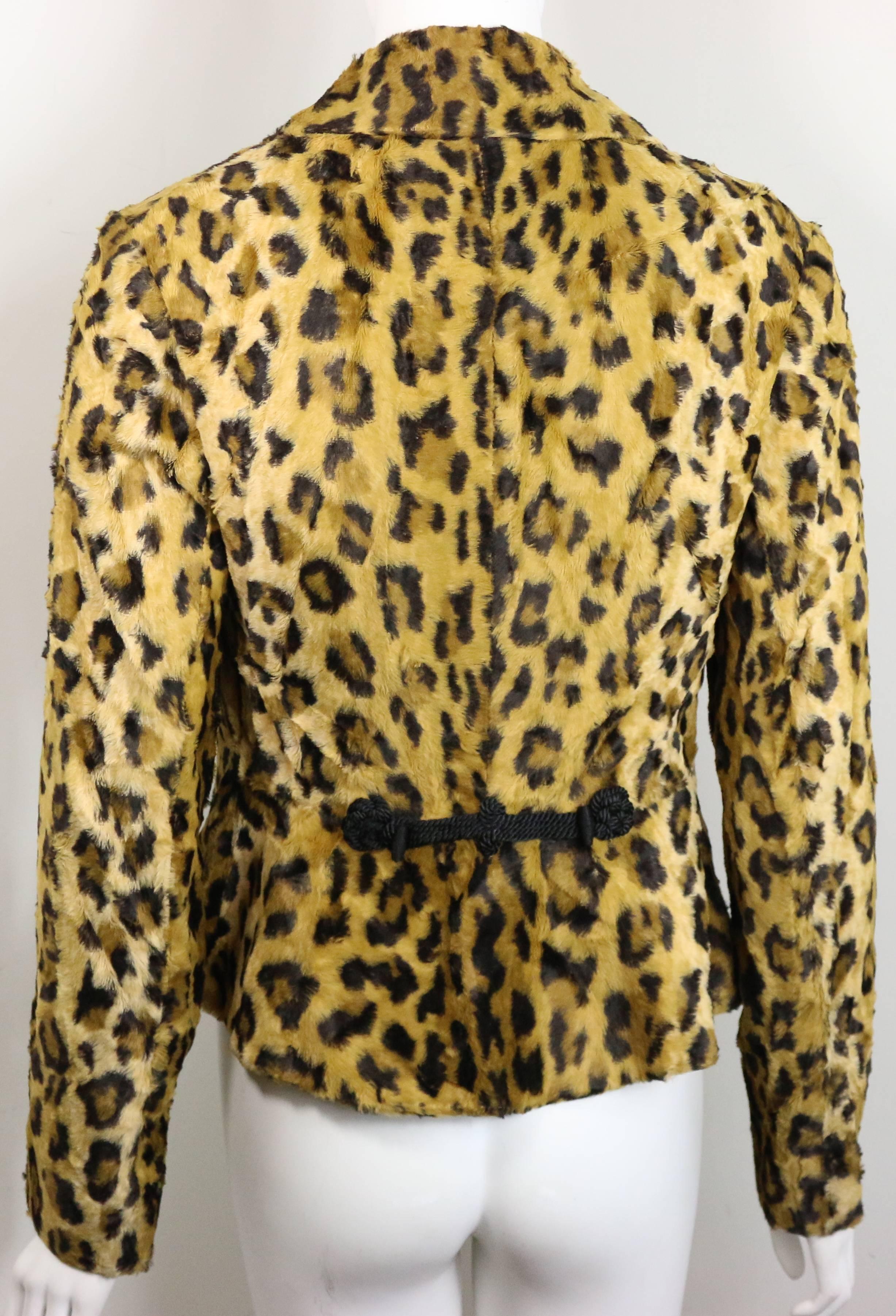 - Vintage 90s Blumarine by Anna Molinari fax fur leopard jacket. Featuring three copper buttons fastening and a tassel like decoration at the back of the jacket made this jacket unique! Also, animal print will never go out of style!!!  

- Made in