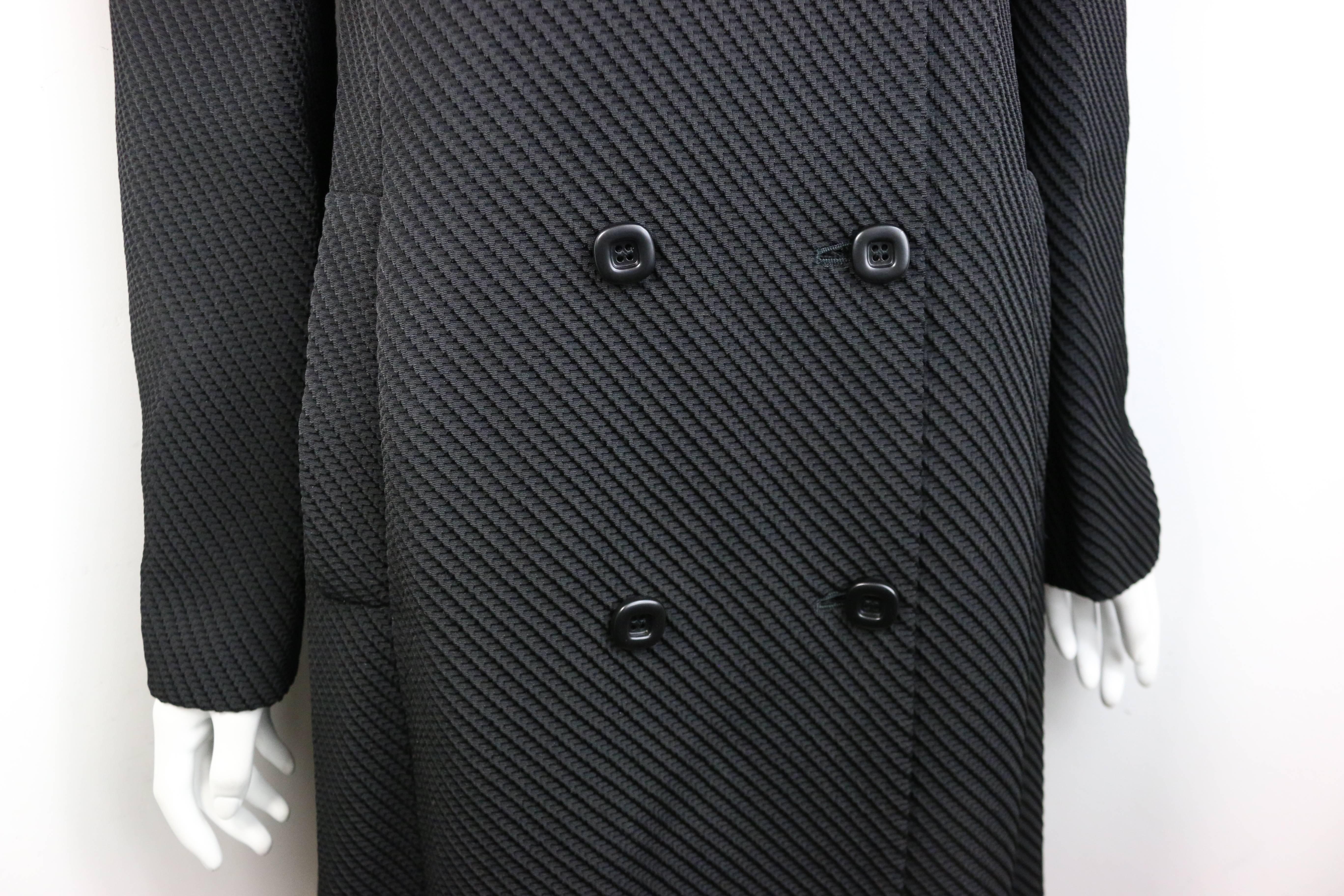 - Vintage 90s Sui by Anna Sui black stripe double breasted coat. This coat is knee length with interesting fabric and pattern design. One of a kind!!! 

- Featuring ten black square buttons fastening. Two side pockets. 

- Made in Italy. 

- Size