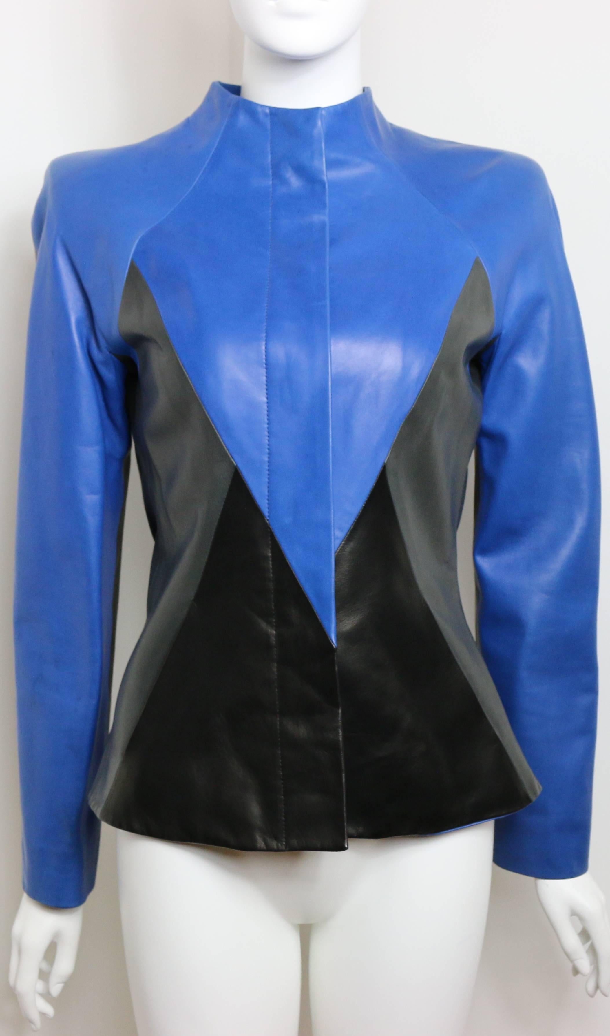 - Vintage 90s Givenchy by Alexander McQueen  blue/black/grey colour blocked geometric shoulder padded leather jacket. This is one of a kind leather jacket!

- Five hidden front panel buttons in blue.   

- Two side pockets. 

- Made in France.

-