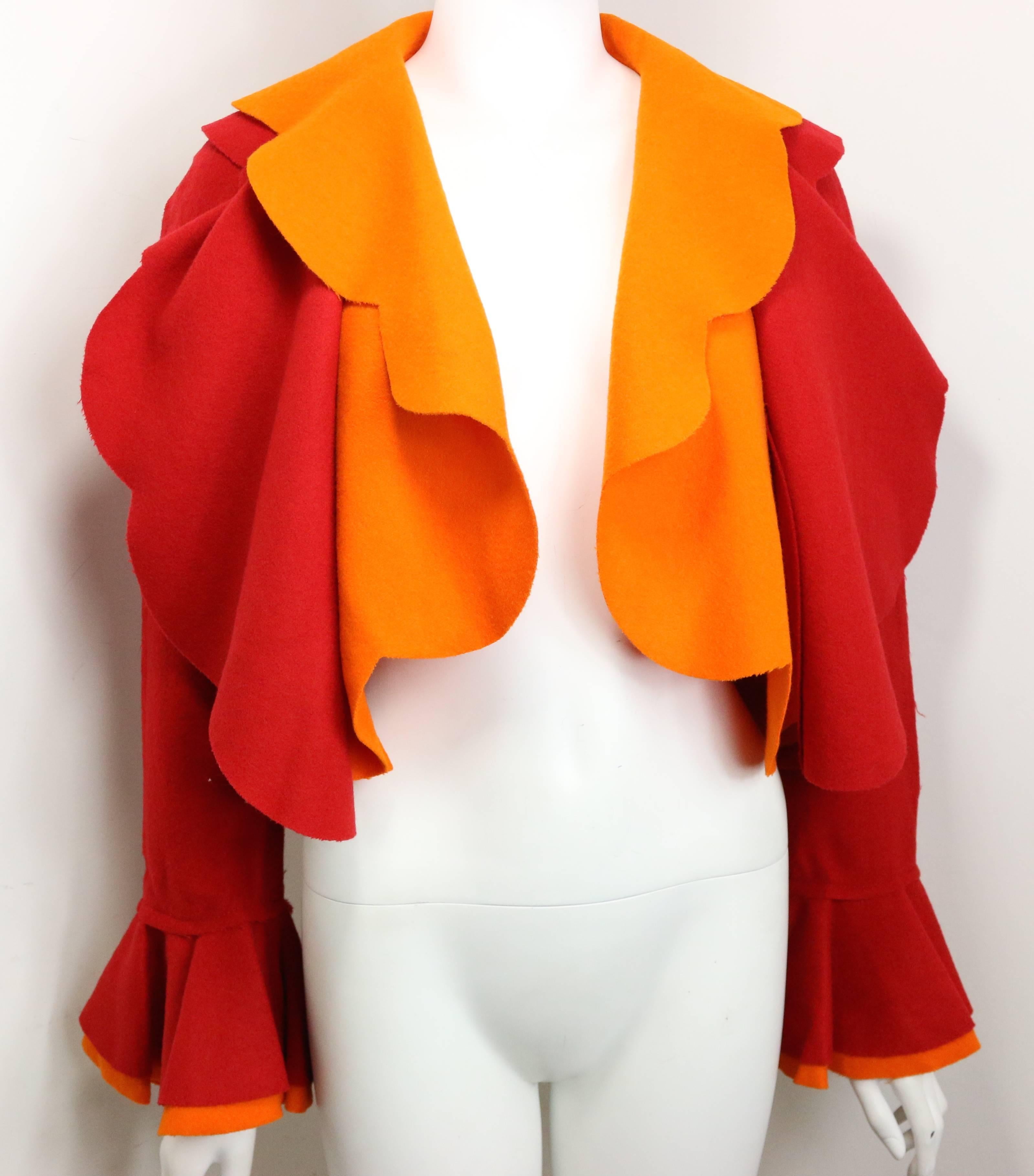 - Vintage 90s Moschino Couture red and orange wool cropped ruffle jacket. This beautiful jacket is double layered on the front and the cuff. The colour is vivid and the ruffle makes you feel like spring flower blouson. 

- Made in Italy. 

-