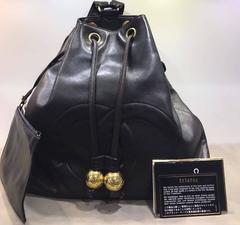 Chanel Black Lambskin Drawstring Backpack with "CC" Stitched Logo