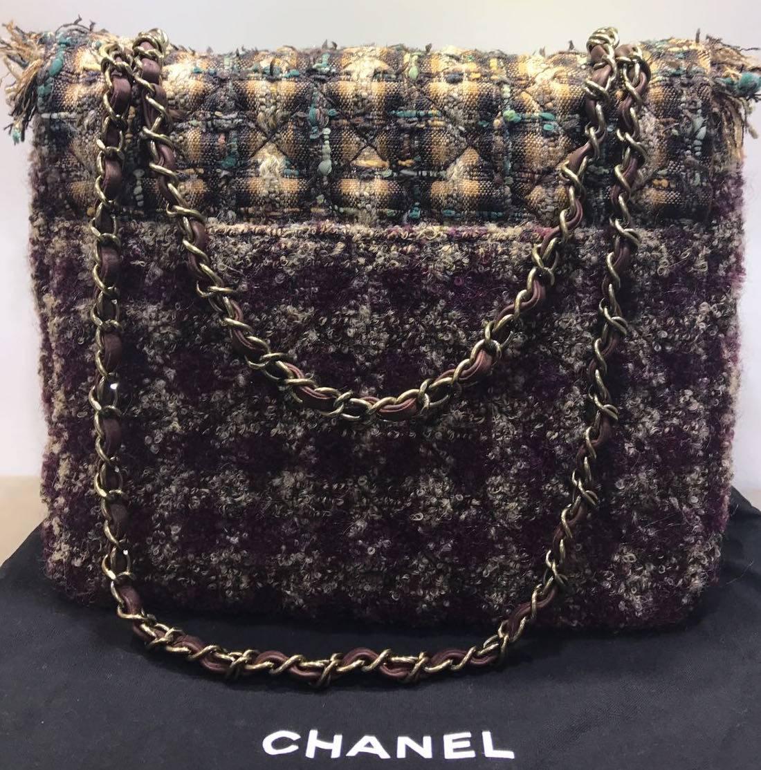 - Chanel multi coloured(yellow, brown, beige, green, red, white and black) tweed flap bag from 2014 collection. This bag is in excellent condition. 

- Featuring brown dark gold chain strap. Dark gold "CC" closing. Maroon satin interior.