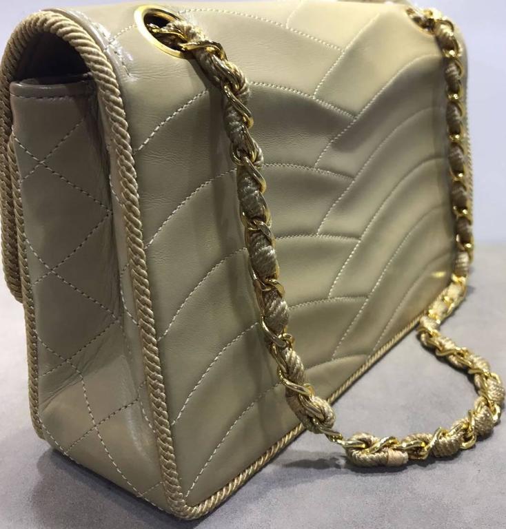 Chanel Early 90s Beige Lambskin Gold Chain Flap Bag at 1stDibs | 90's ...