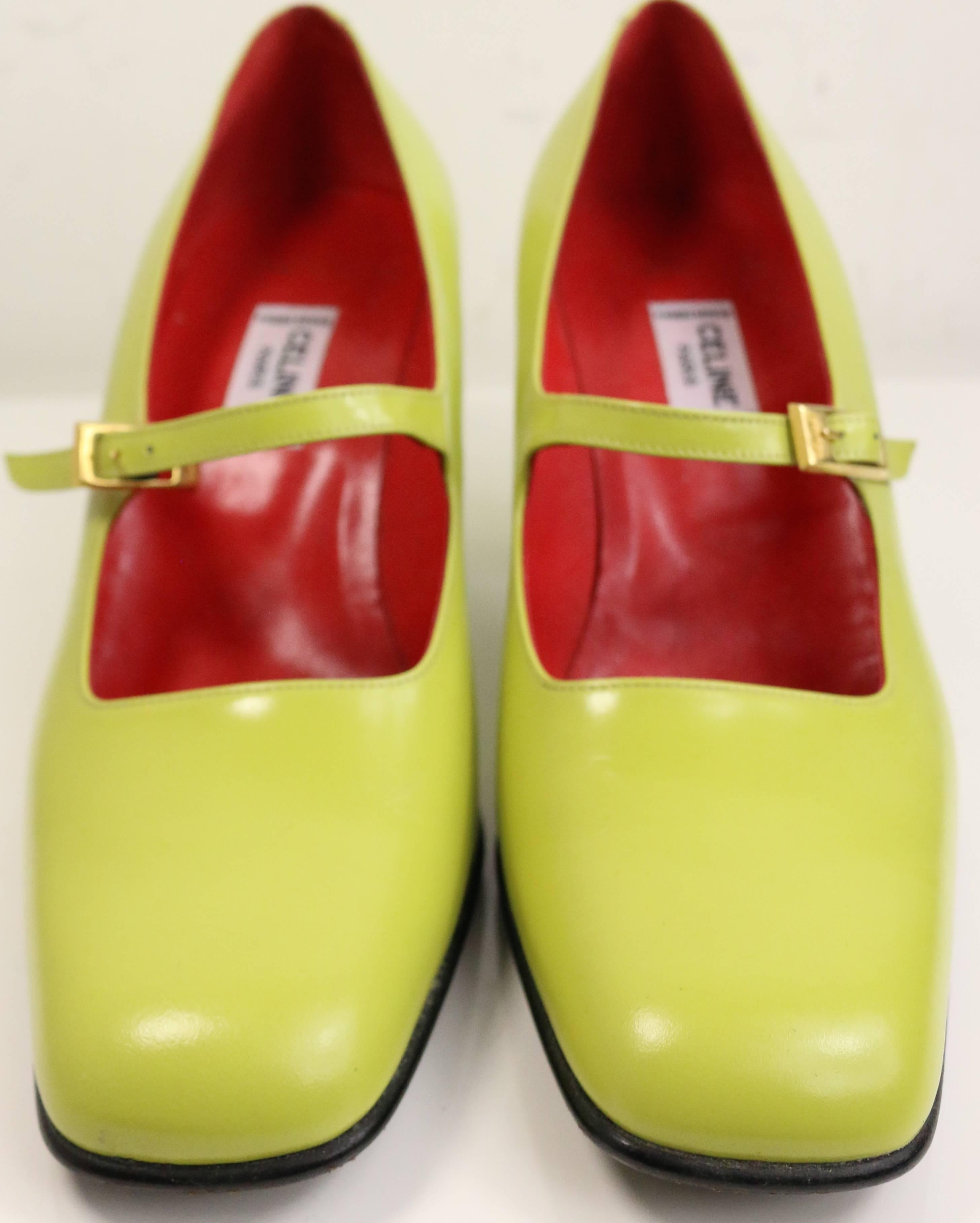 - Vintage 90s Celine green leather mary jane shoes. The colourful combination with red interior is very original and vintage like. One of a kind! 

- Featuring gold toned 