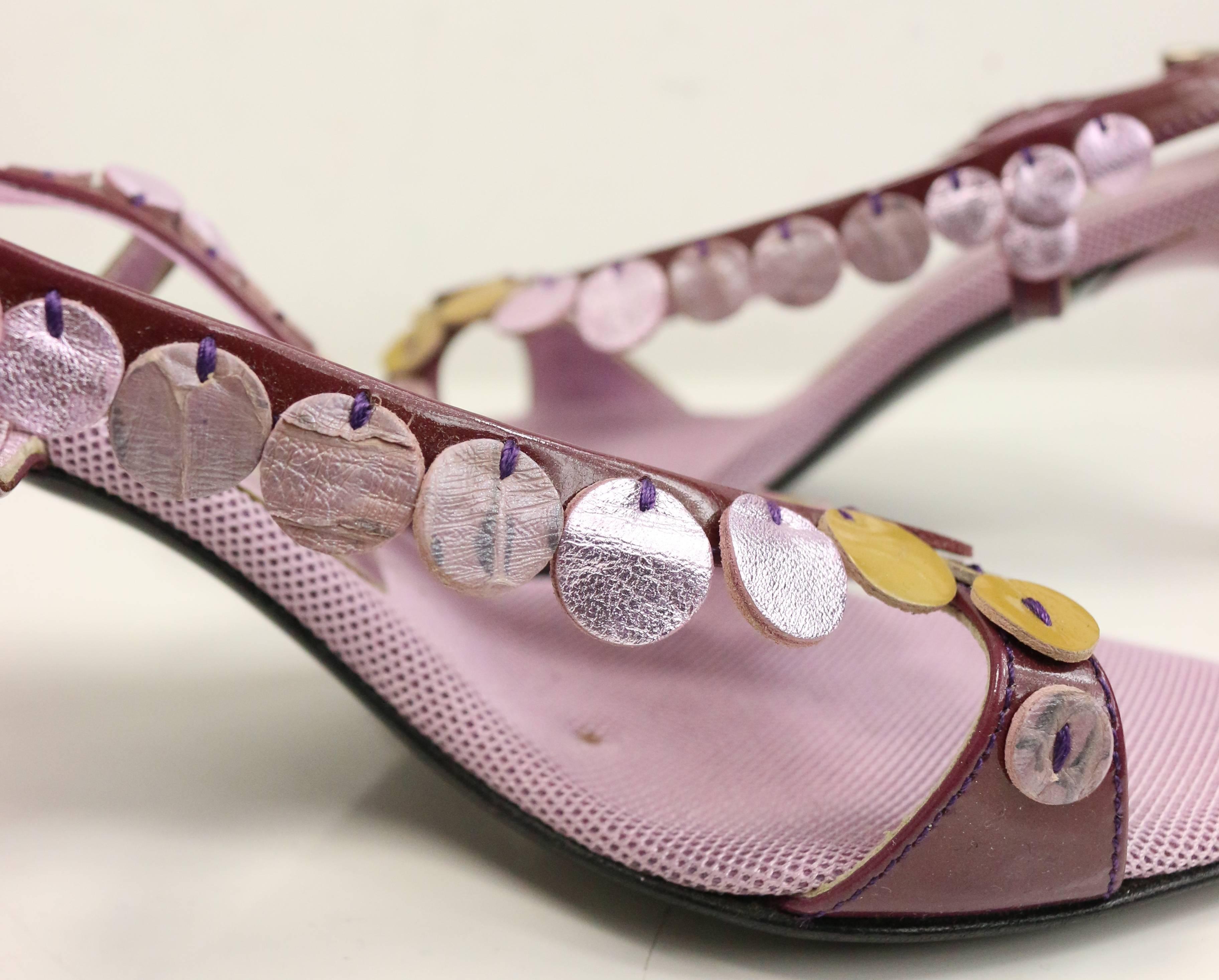 - Vintage 90s Prada purple metallic leather sequins sandals. Featuring metallic purple leather, shiny beige leather sequins trim patent straps. Combination of mesh and metallic interior and purple plastic heels. Using different colours and materials