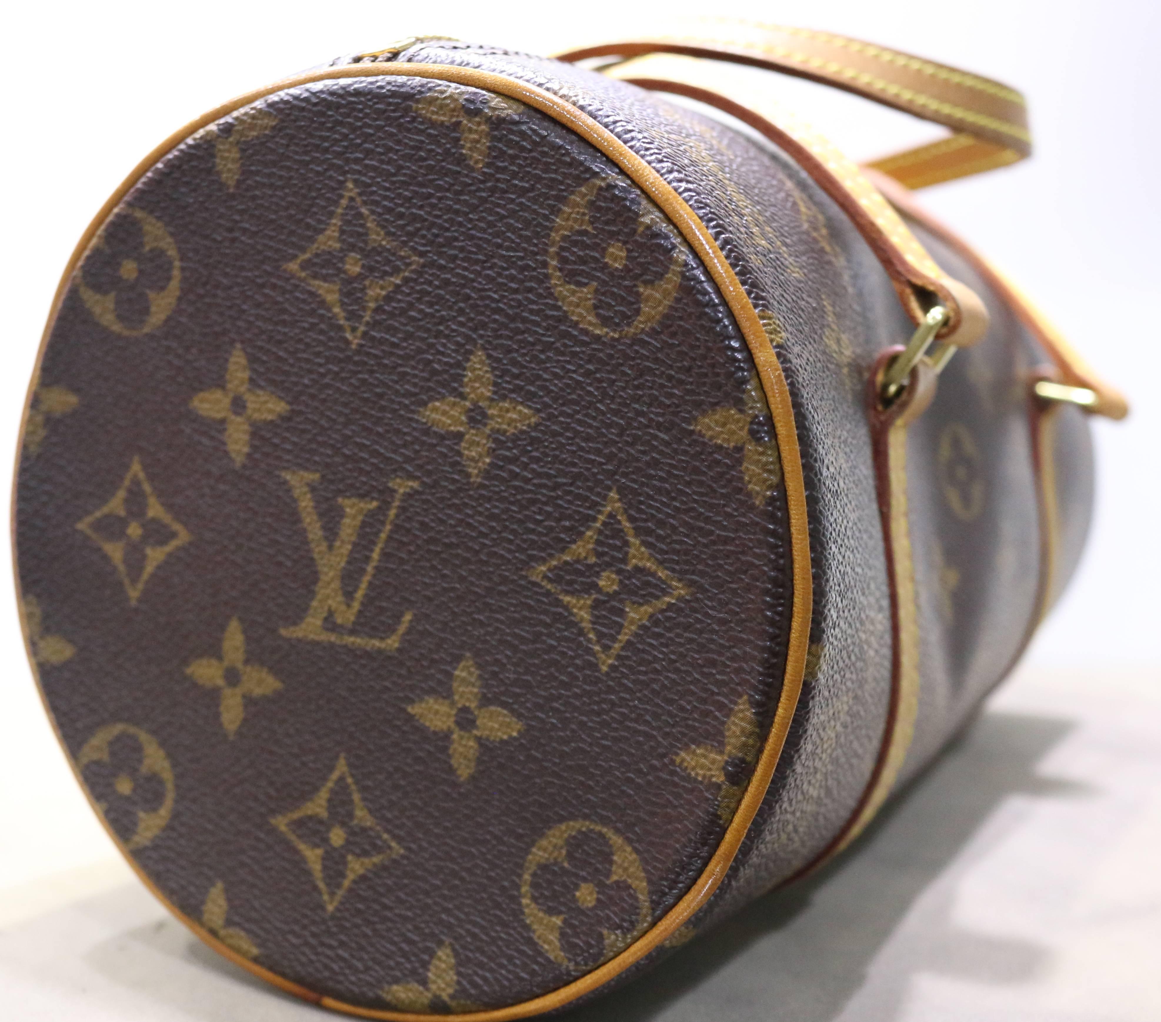 - This classic rounded shape with two straps monogram canvas is Louis Vuitton's trademark. It was originally designed by Henri Vuitton in 1966 and it has since become one of the popular bag among the collection.  The condition is excellent and it is