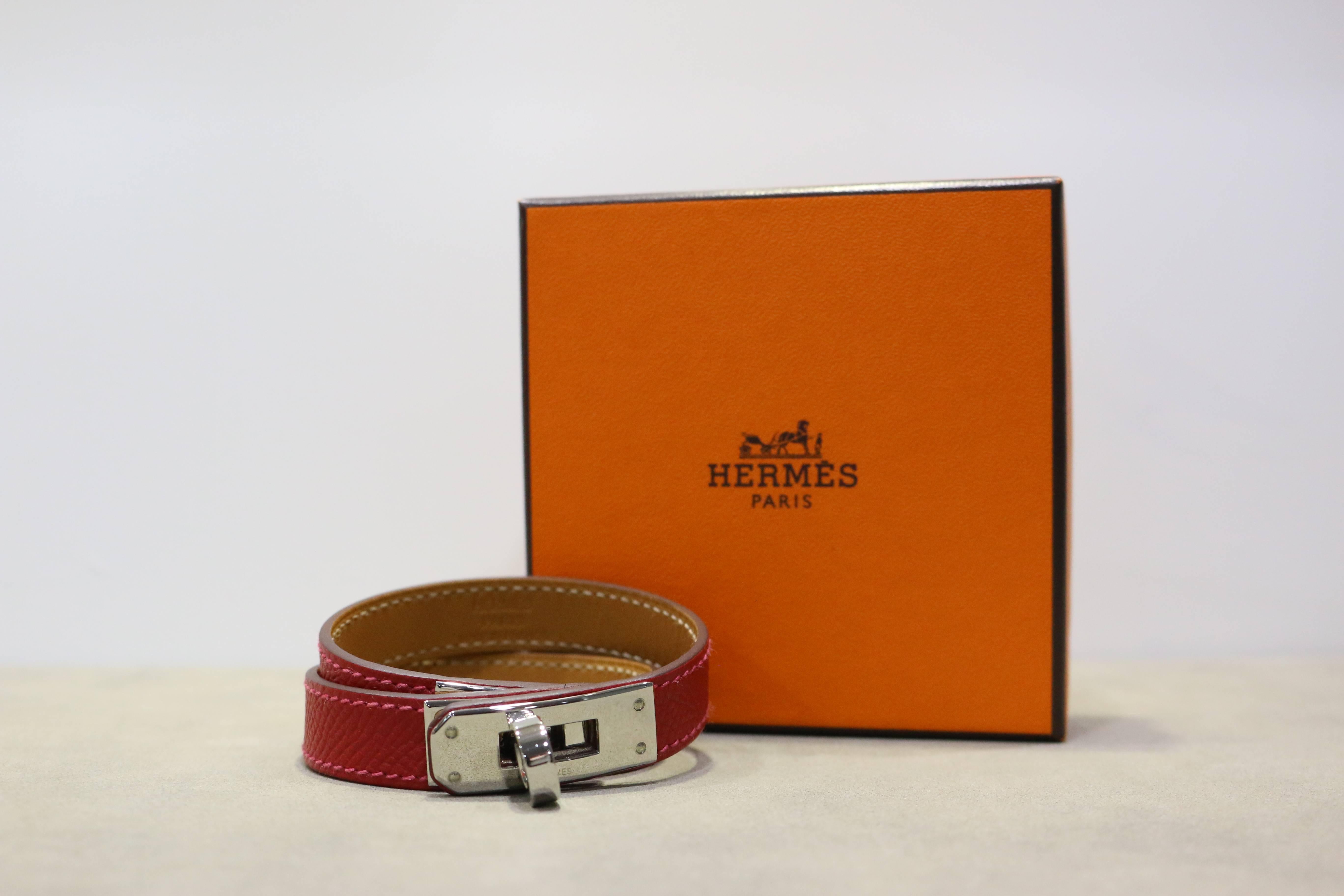 - Authentic and brand new Hermes red Kelly double tour leather bracelet in silver toned hardware. It is a classic leather bracelet with a sense of chicness! 

- Made in France. 

- Measurement: 37.5 cm 

- It comes with dust bag and original box. 