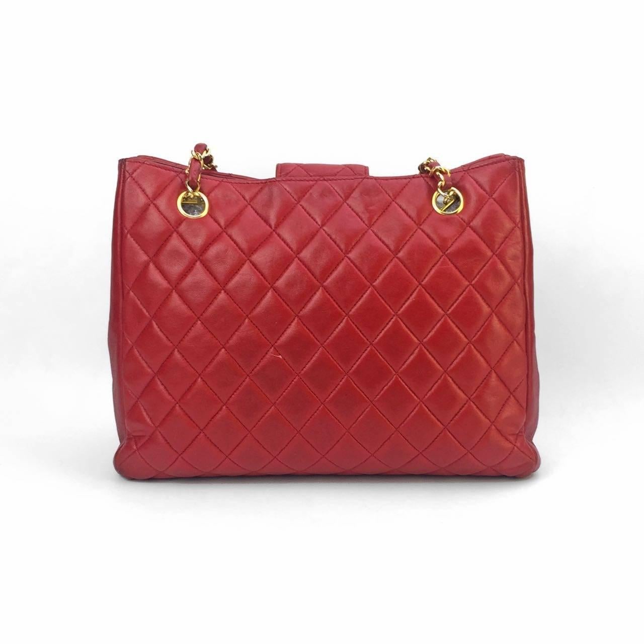 - Vintage 90s Chanel classic red quilted lambskin leather gold chain strap shoulder bag.  Featuring small flap with Gold 