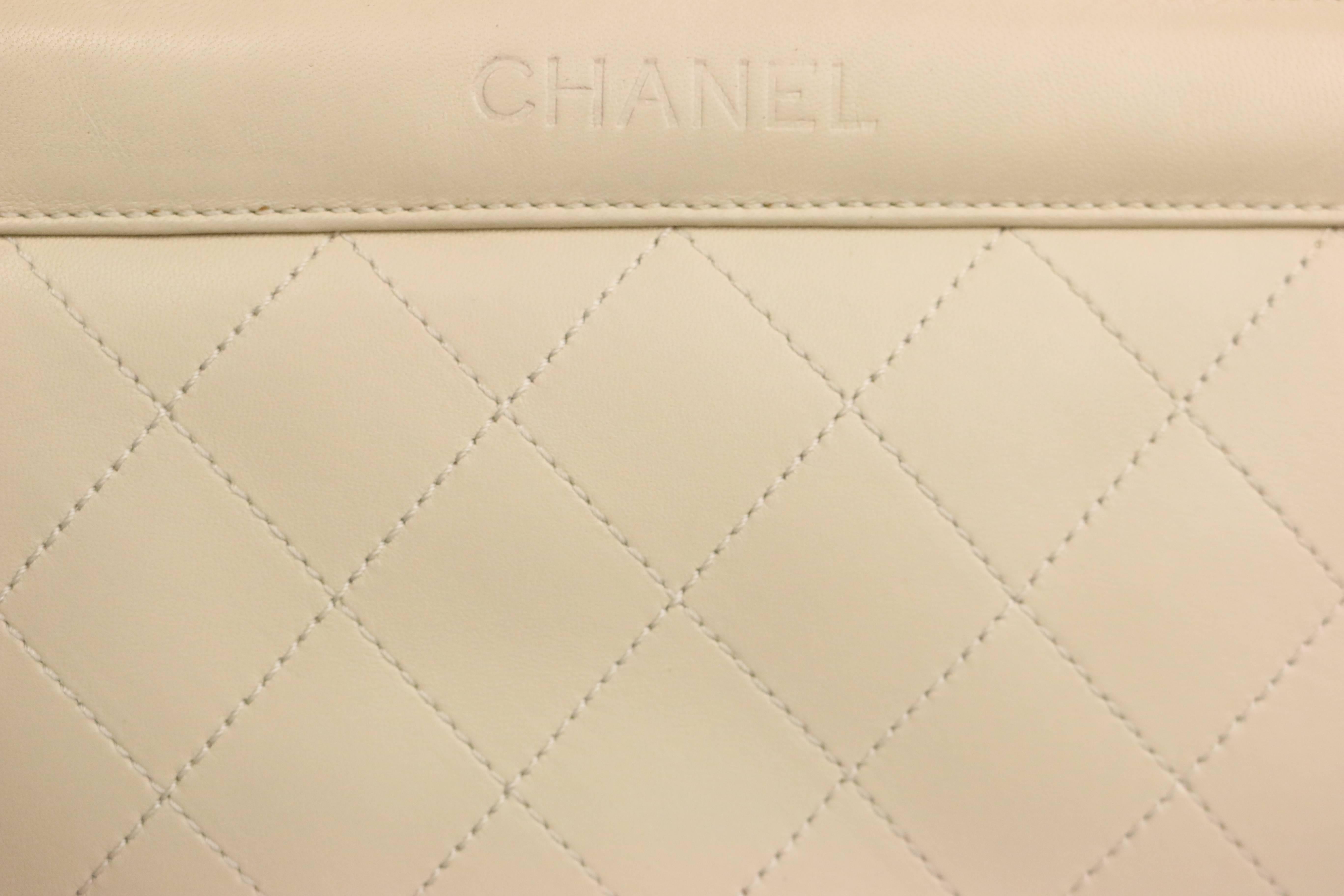 - This Chanel bag is made from light beige leather with an iconic quilted patter. Featuring the same colour leather shoulder strap, a "Chanel" written in front, a magnetic closure, and two interior compartments with one zippered and one