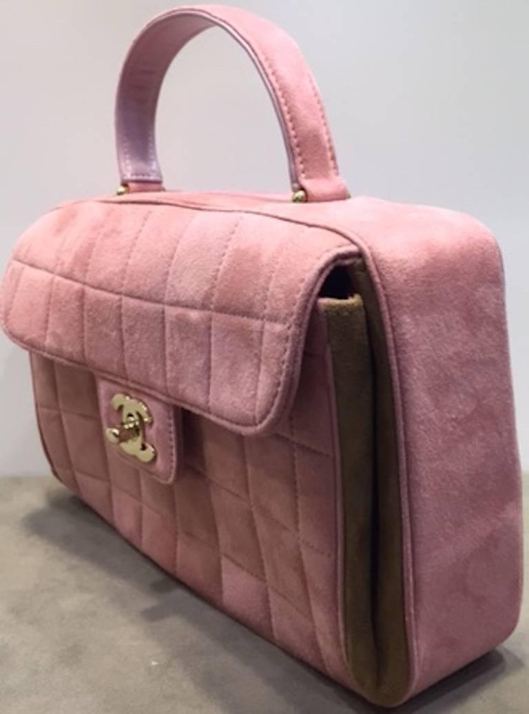 pink suede handbag