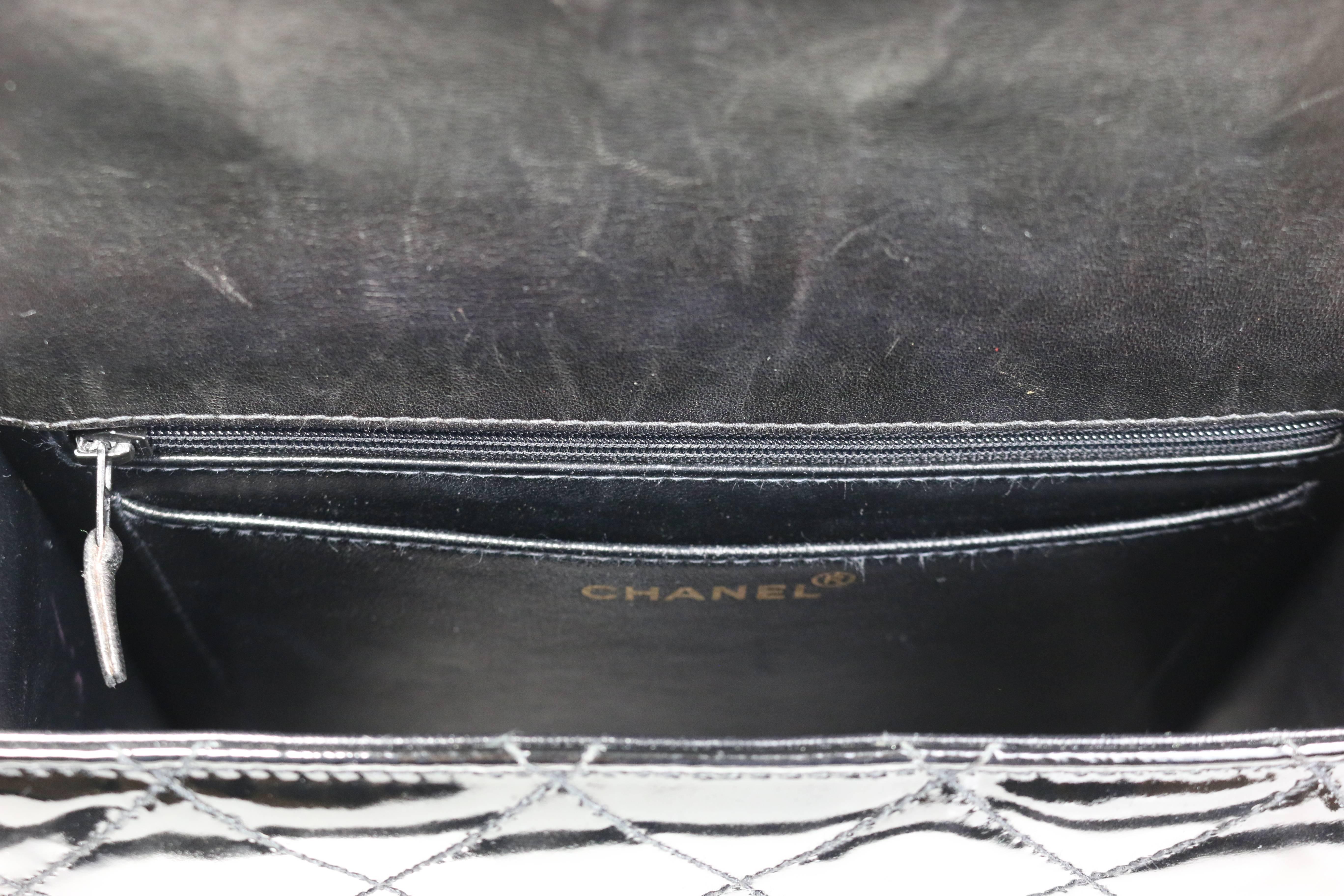 Women's Chanel Black Quilted Patent Leather Handbag