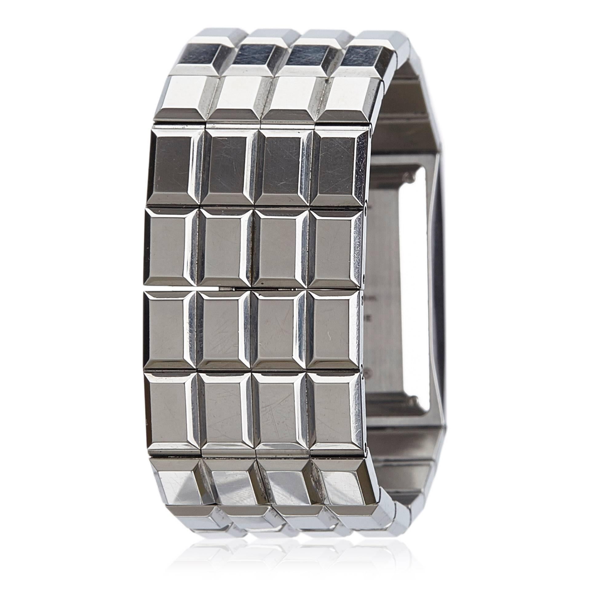 - This Chanel Chocolat stainless steel watch features silver-tone hardware and a quartz movement.

- Watch Specifications Face: 1.5 x 1cm Case: 3.5 x 2.4cm Wrist Size: 19cm Belt: 2.4cm Weight:100gm

- Glass Type: Mineral Glass. 

- Clasp Type: