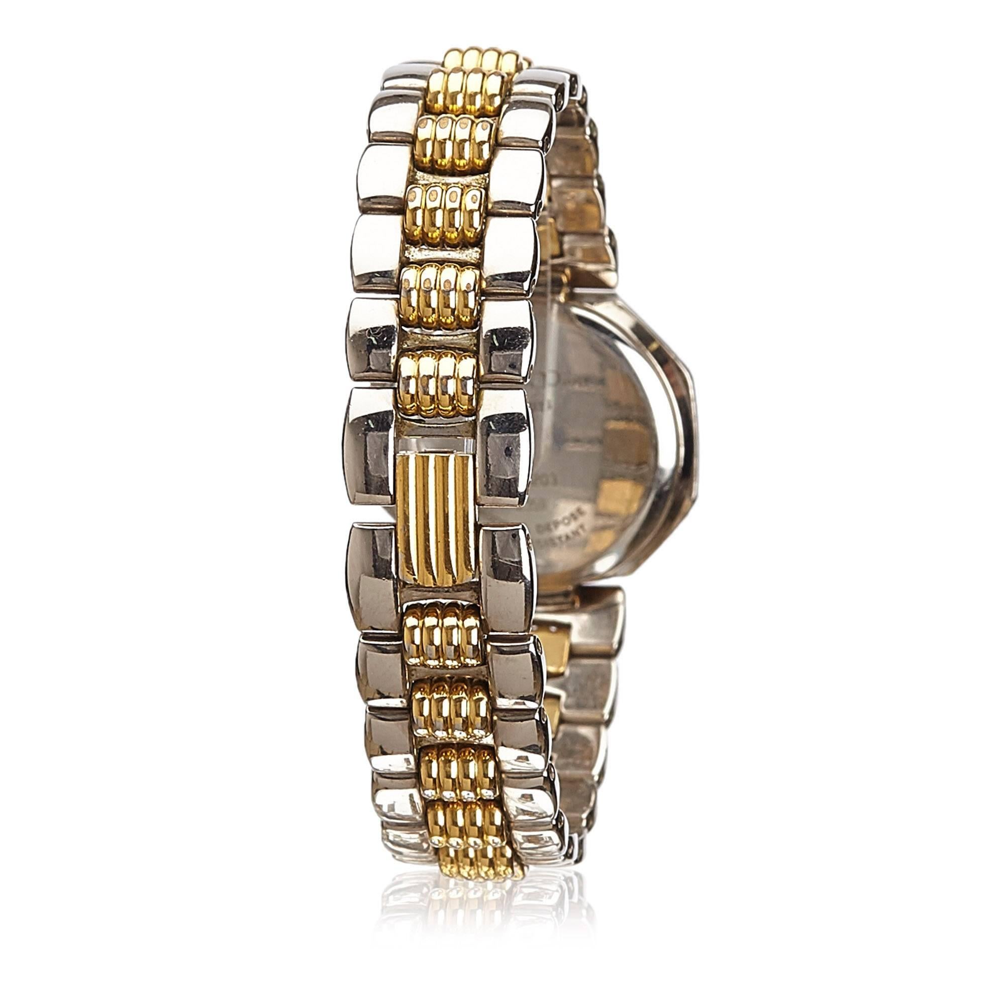 - This Christian Dior watch features gold and silver-tone hardware, a diamond-studded face, a deployant closure, and quartz movement.

- Watch Specifications Face: 2 x 2cm. 

- Case:  2.8 x 2.5cm.  

- Wrist Size: 16.5cm. 

- Belt: 1.4cm. 

- Made