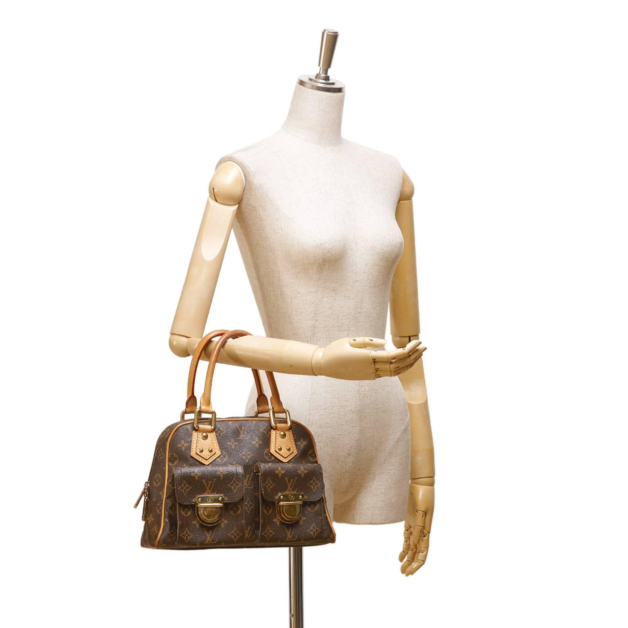 - This Louis Vuitton Manhattan PM Bag features a coated monogram canvas body, rolled leather handles, exterior flap pockets with gold-tone hardware and buckle closures, a top zip closure, and an interior slip pocket. Its a great combination of Marc