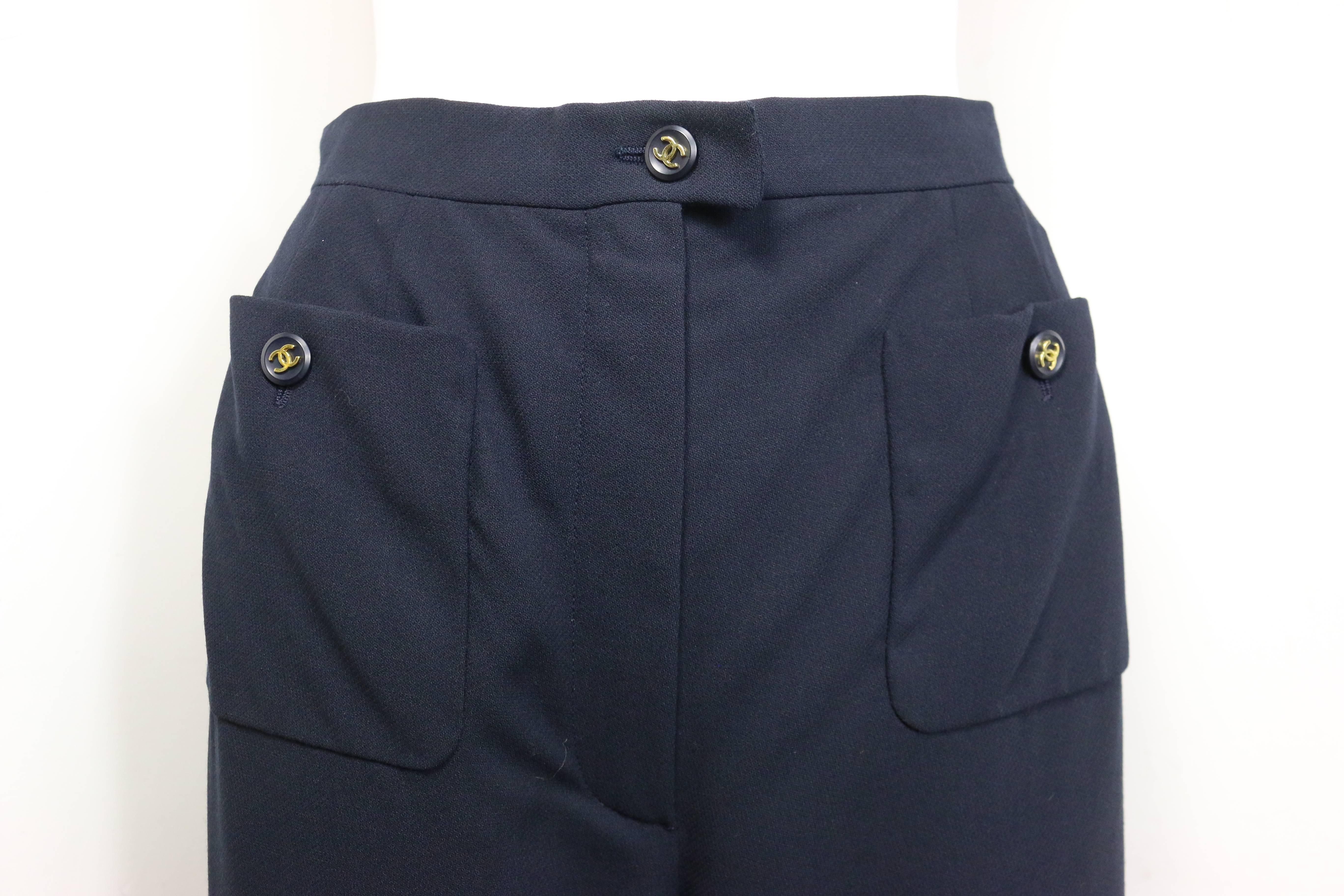 - Chanel navy wool wild legs pants from 1995 cruise collection. Featuring two gold 