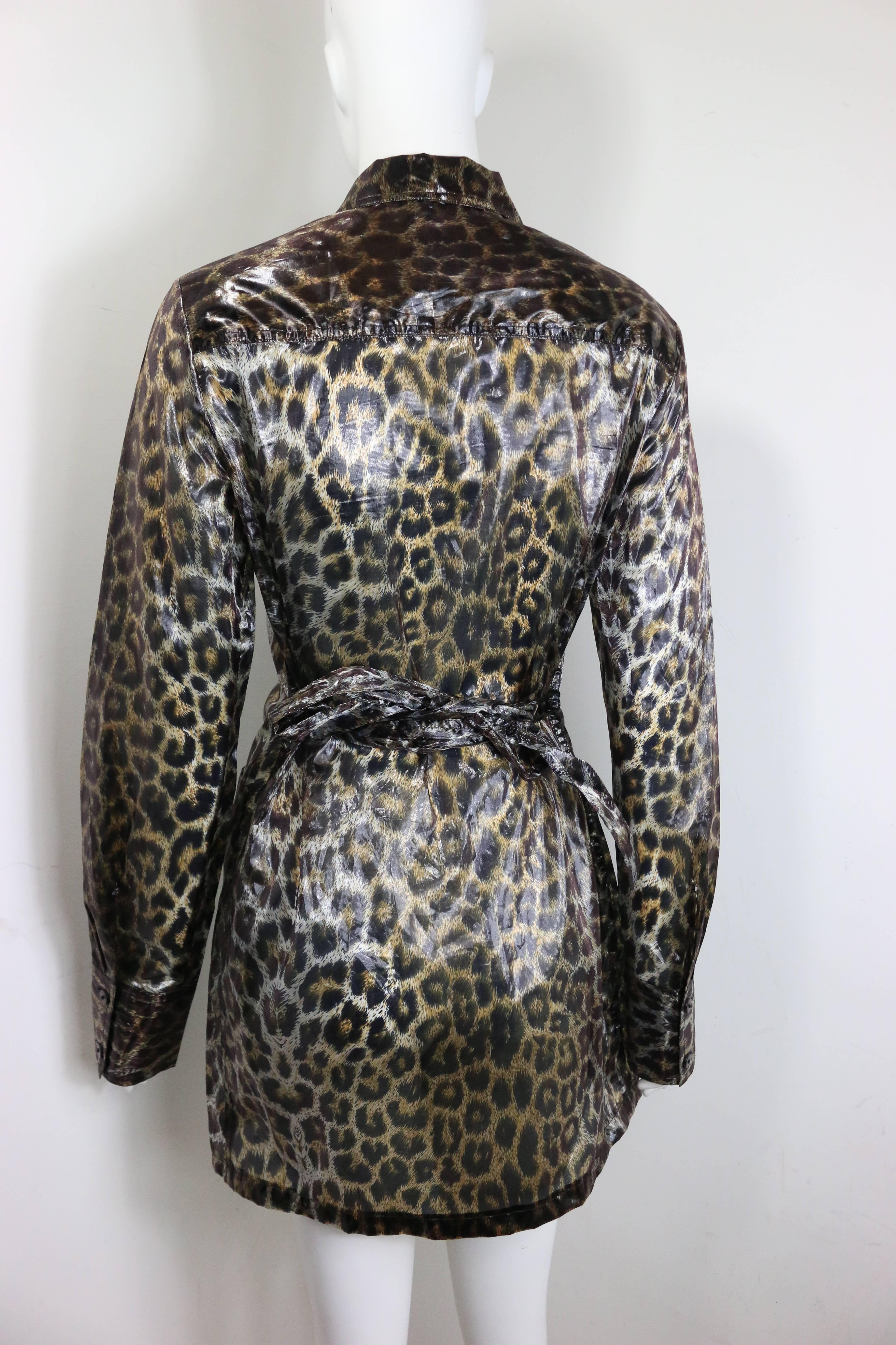 - Vintage 90s Plein Sud leopard print belted jacket. Featuring nine buttons fastening, two buttons closure on each cuff and  four front pockets. This interesting jacket is made in polyester and nylon. Shiny and thin fabric that you can see through