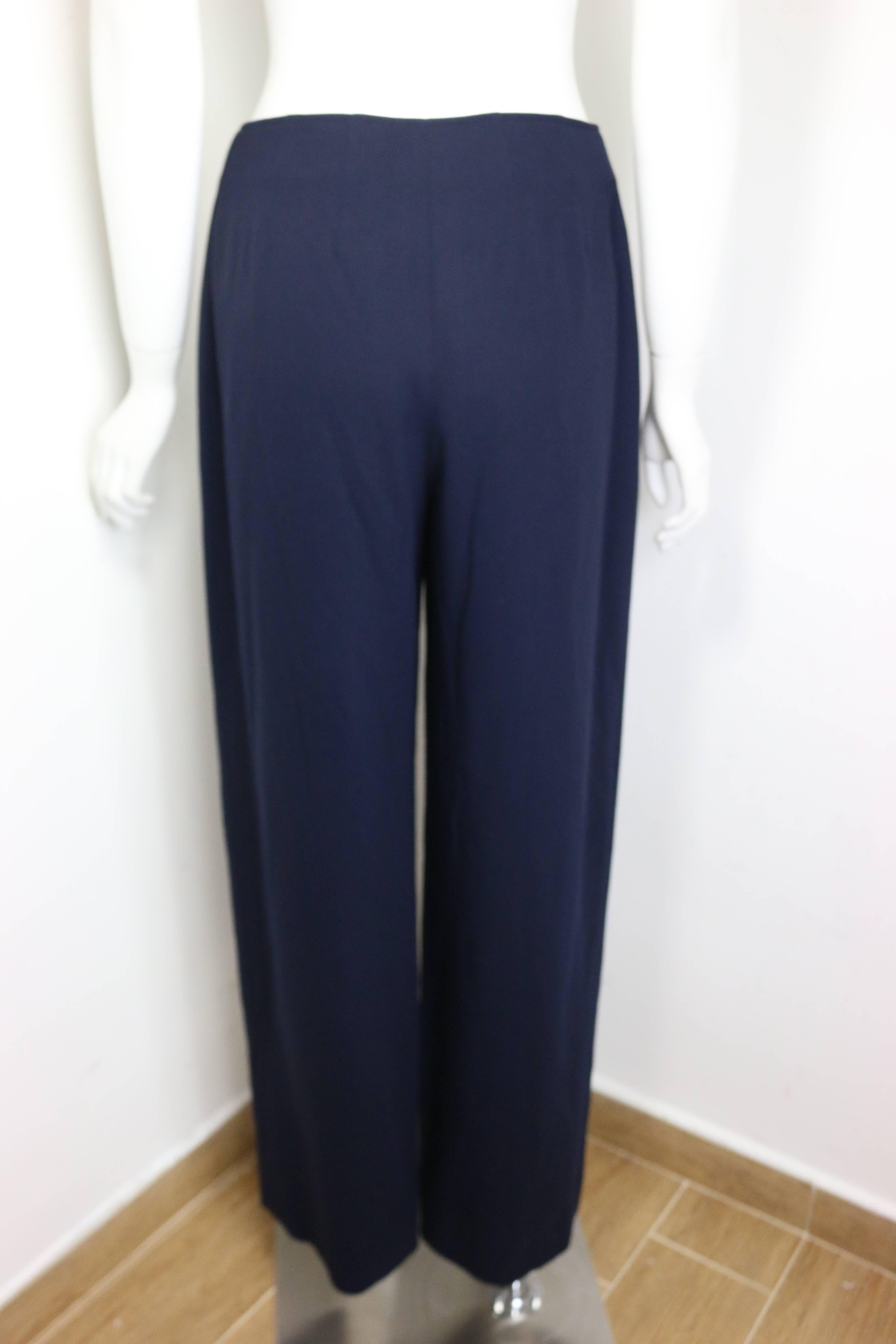 - Vintage Chanel navy wool pants from year 1994 pre collection. Featuring nine black and gold 